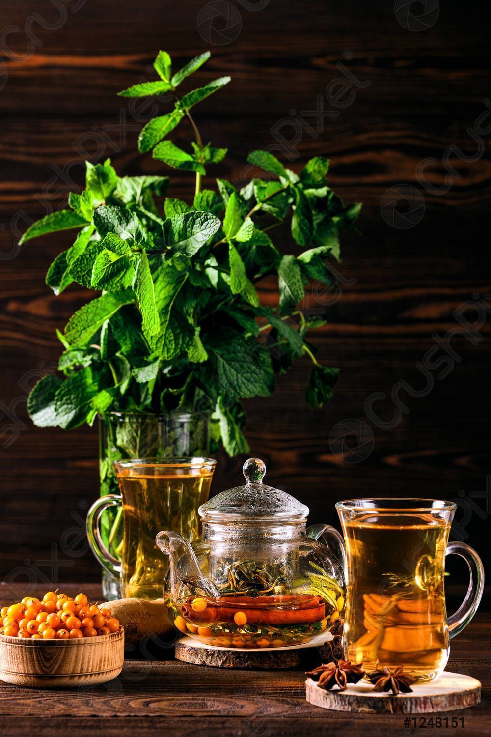 1000x1500 Low key photo of hot herbal tea with sea buckthorn