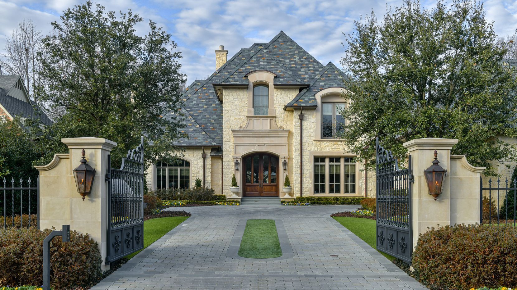 1660x934 This Preston Hollow home has designer wallpaper, a media room and a private backyard