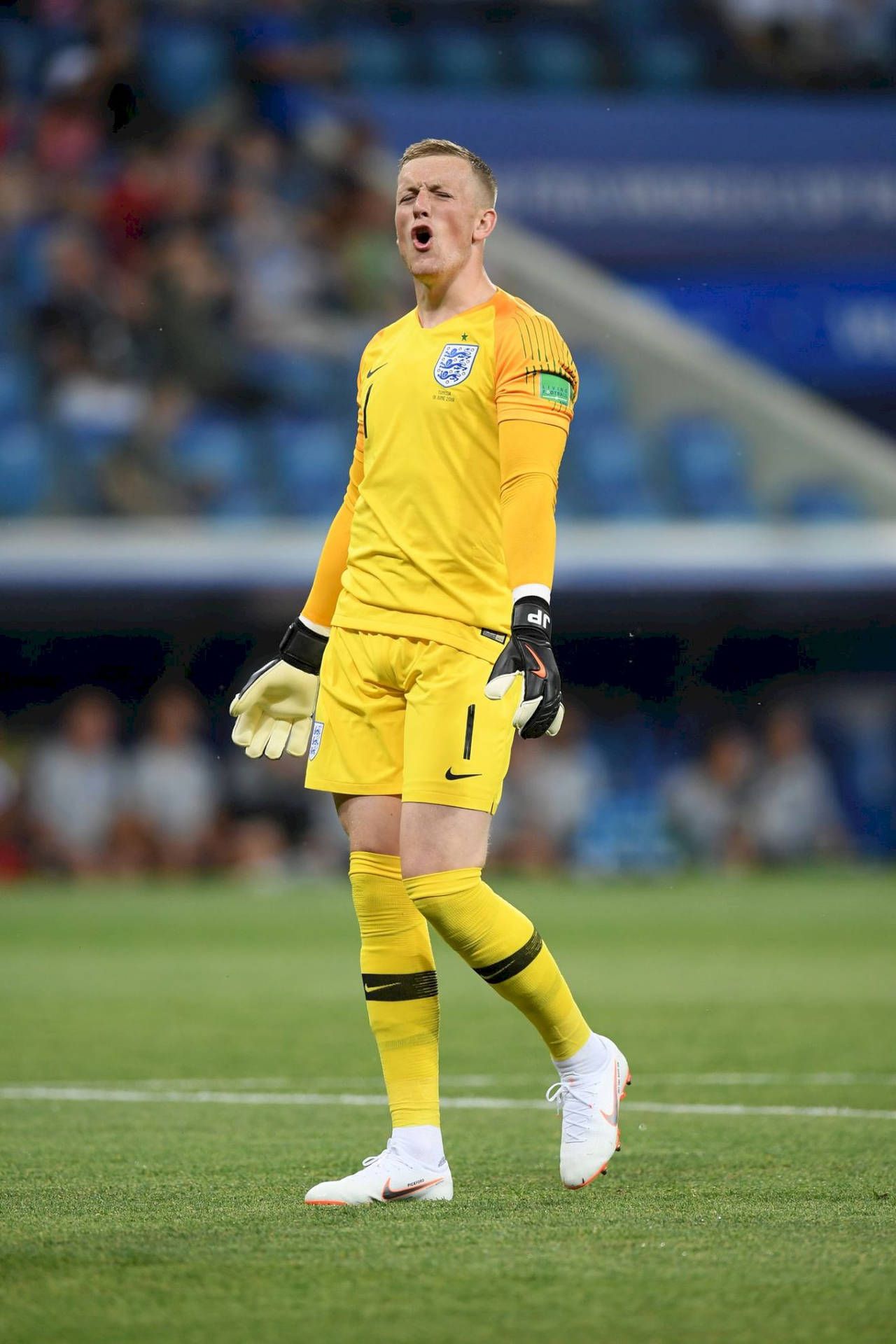 1280x1920 Download Full Body Jordan Pickford In Yellow Wallpaper