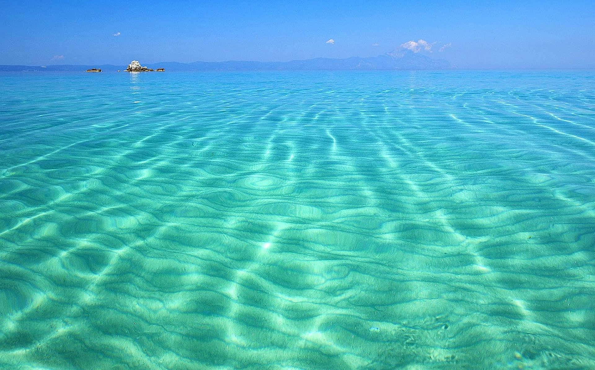 1920x1195 Download Serene Greek Beach with Turquoise Waters and White Sand Wallpaper