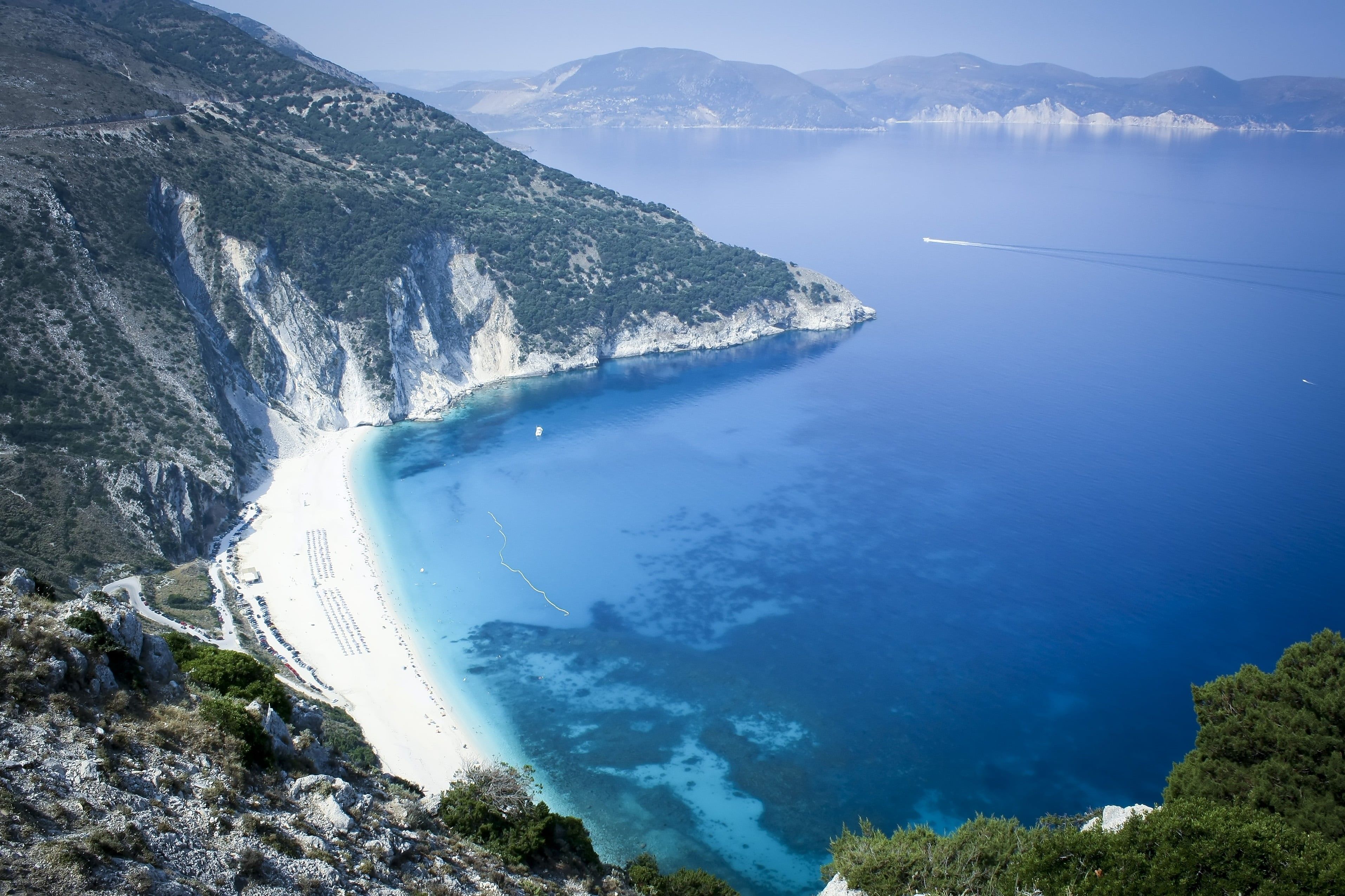 3828x2552 Wallpaper / beside, Beach, Sun, travel, white, Boat, Greek, ocean, Water Blue, scenics, Nature, Greece, sea, summer, blue, Ocean Water, mountain, coastline, Sand free download