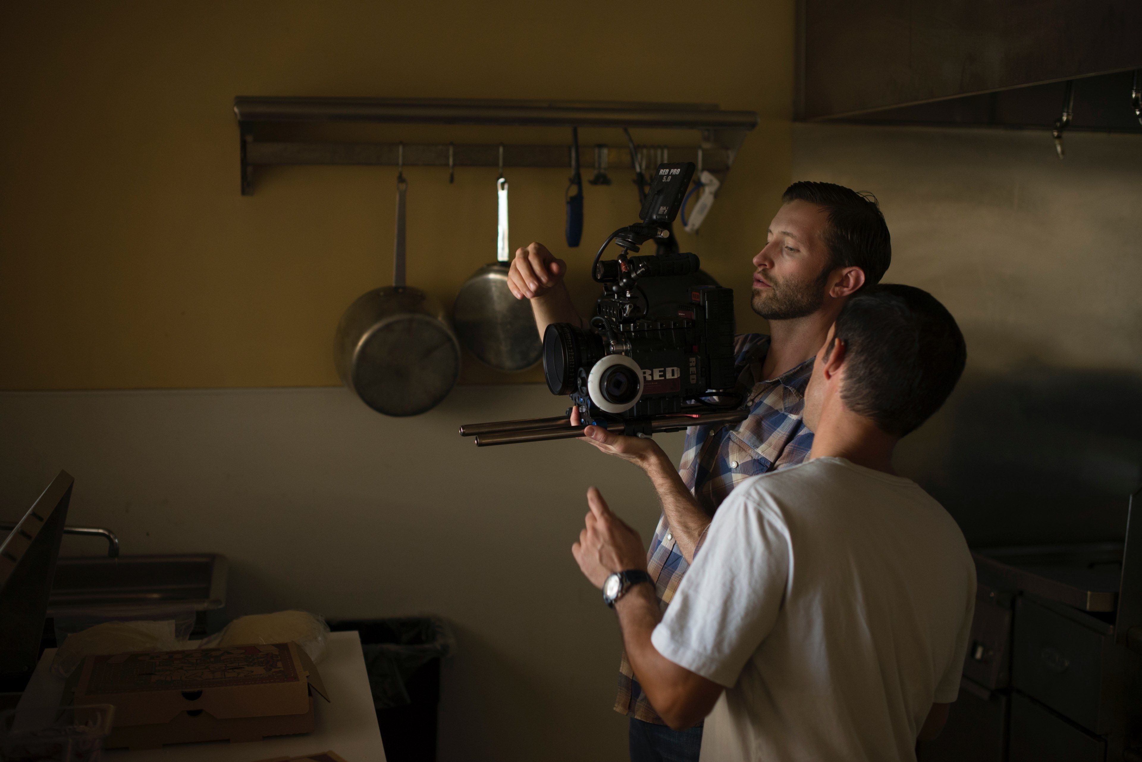 3840x2563 Wallpaper / two men set up cinema camera for a shot in a kitchen, cameramen in kitchen 4k wallpaper free download