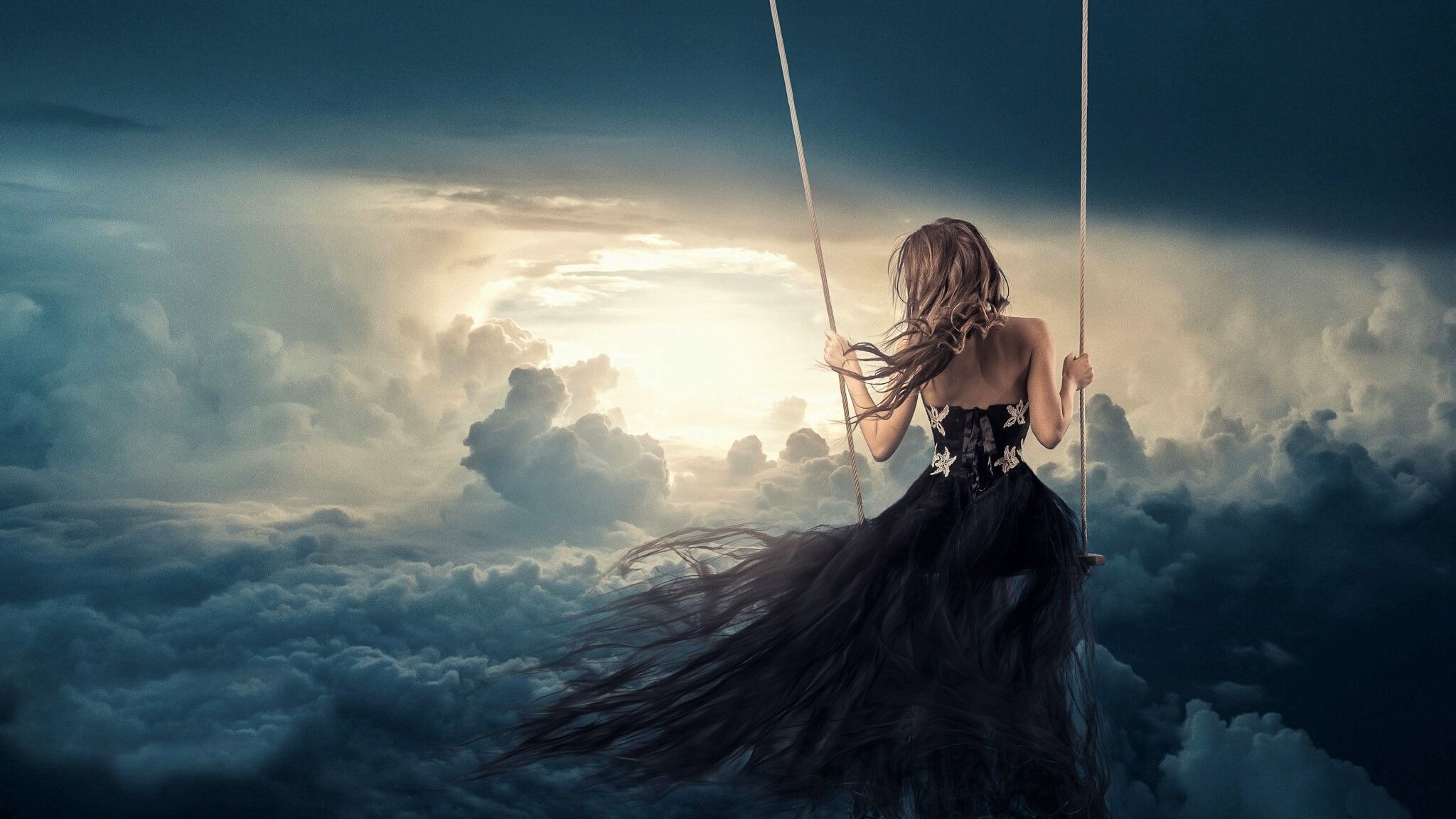 2048x1152 Swinging Above the Clouds