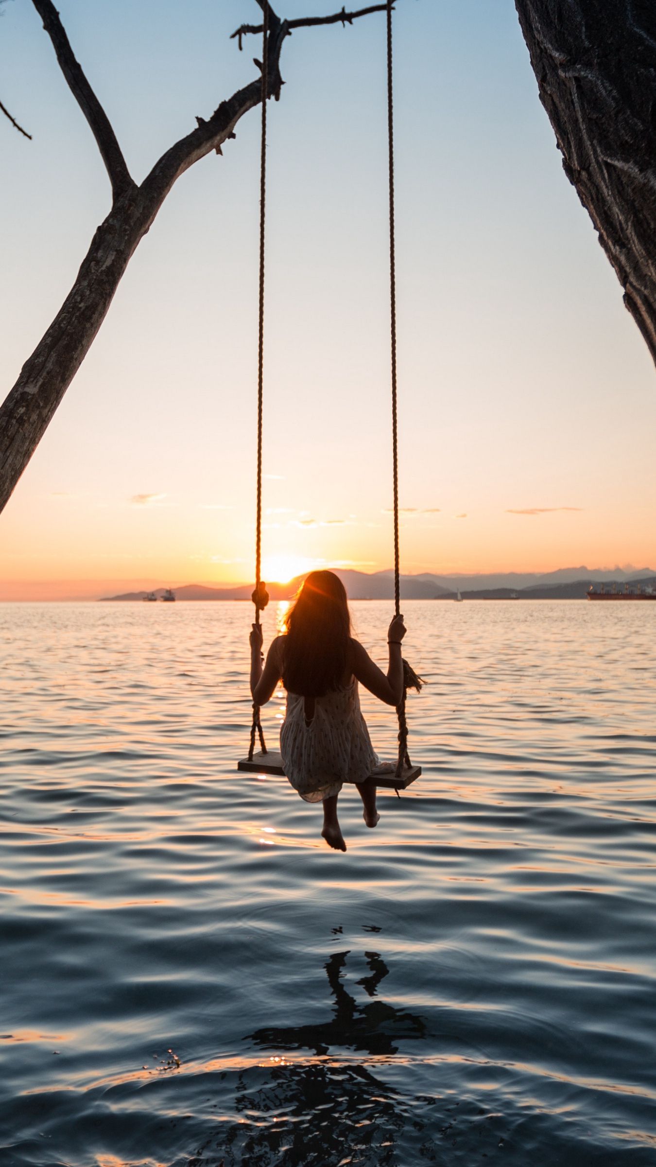 1350x2400 Girl And Swing Wallpaper