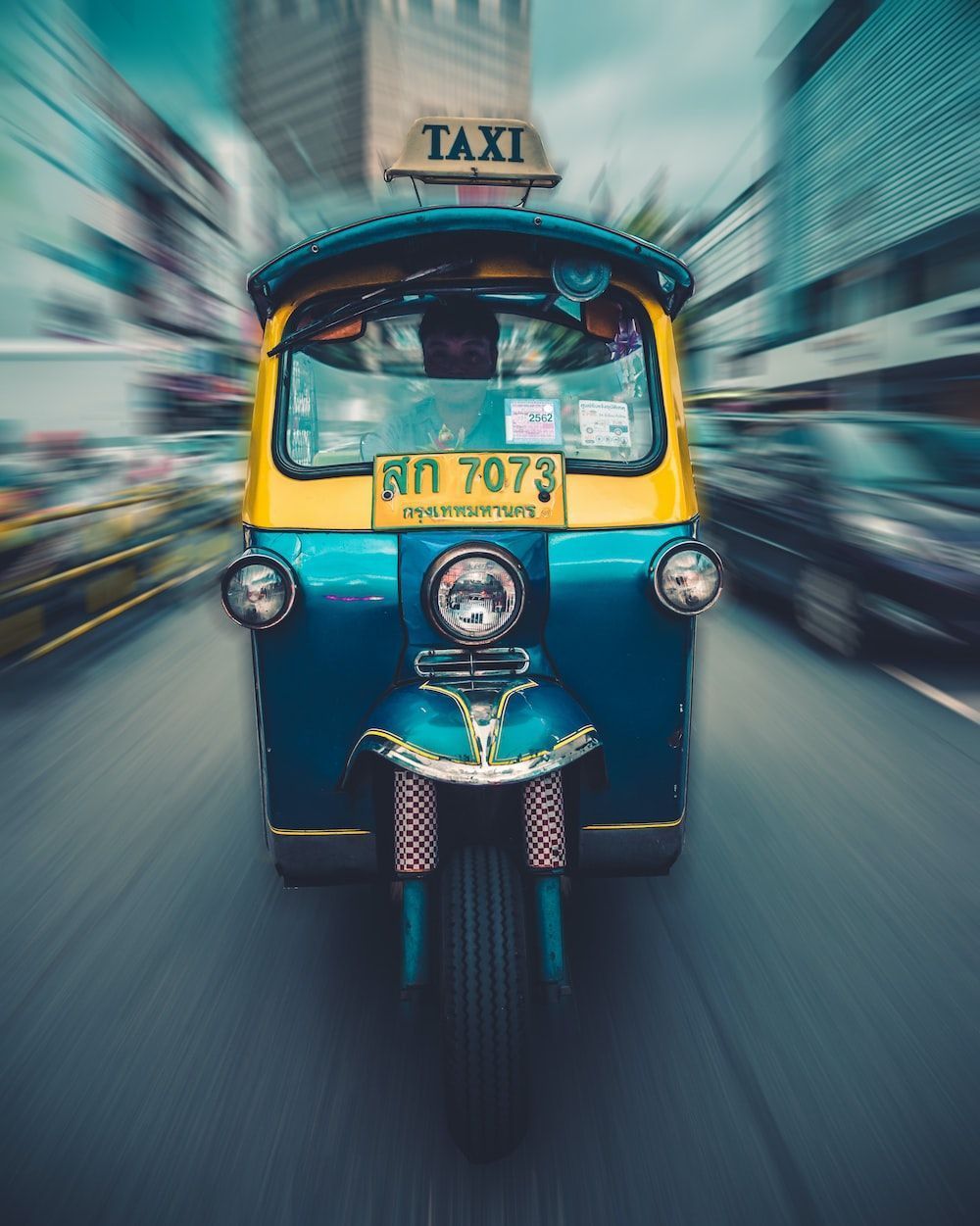 1000x1251 Teal and yellow auto rickshaw photo