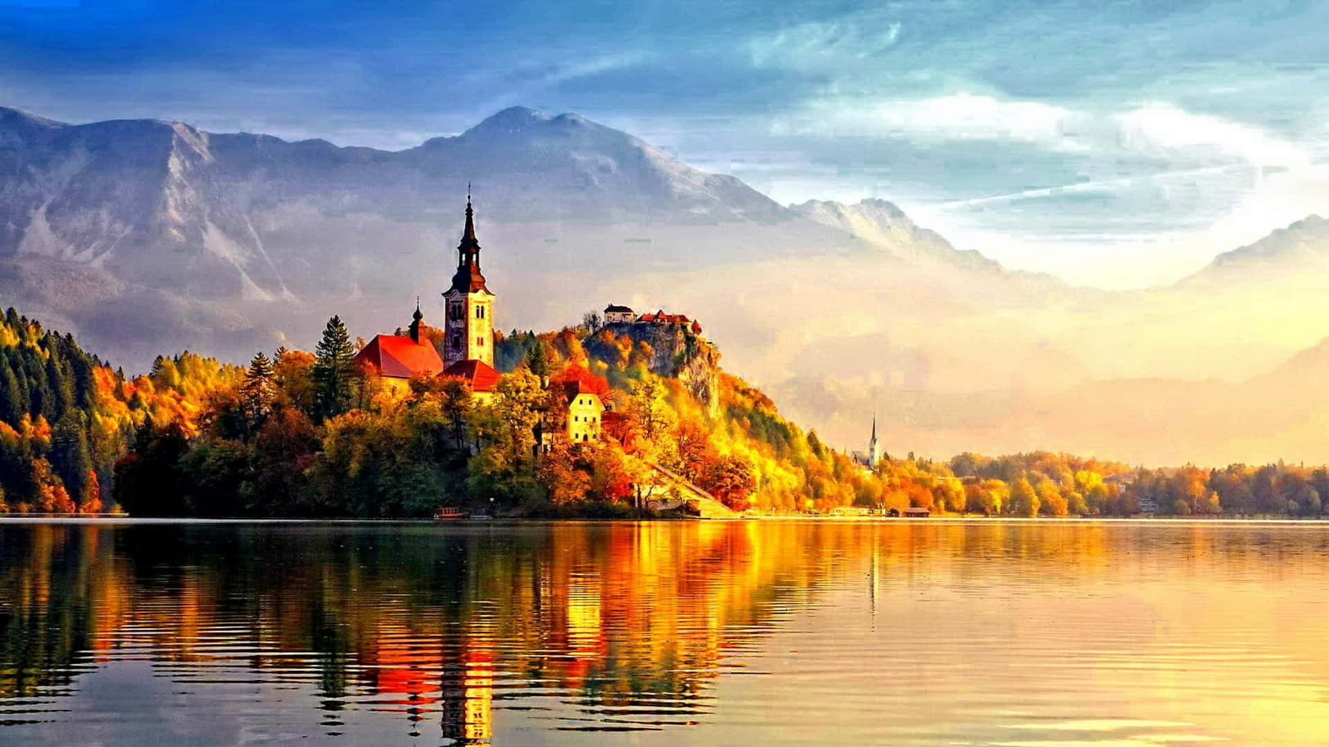 1920x1080 Download Sunlight Striking Lake Bled Wallpaper