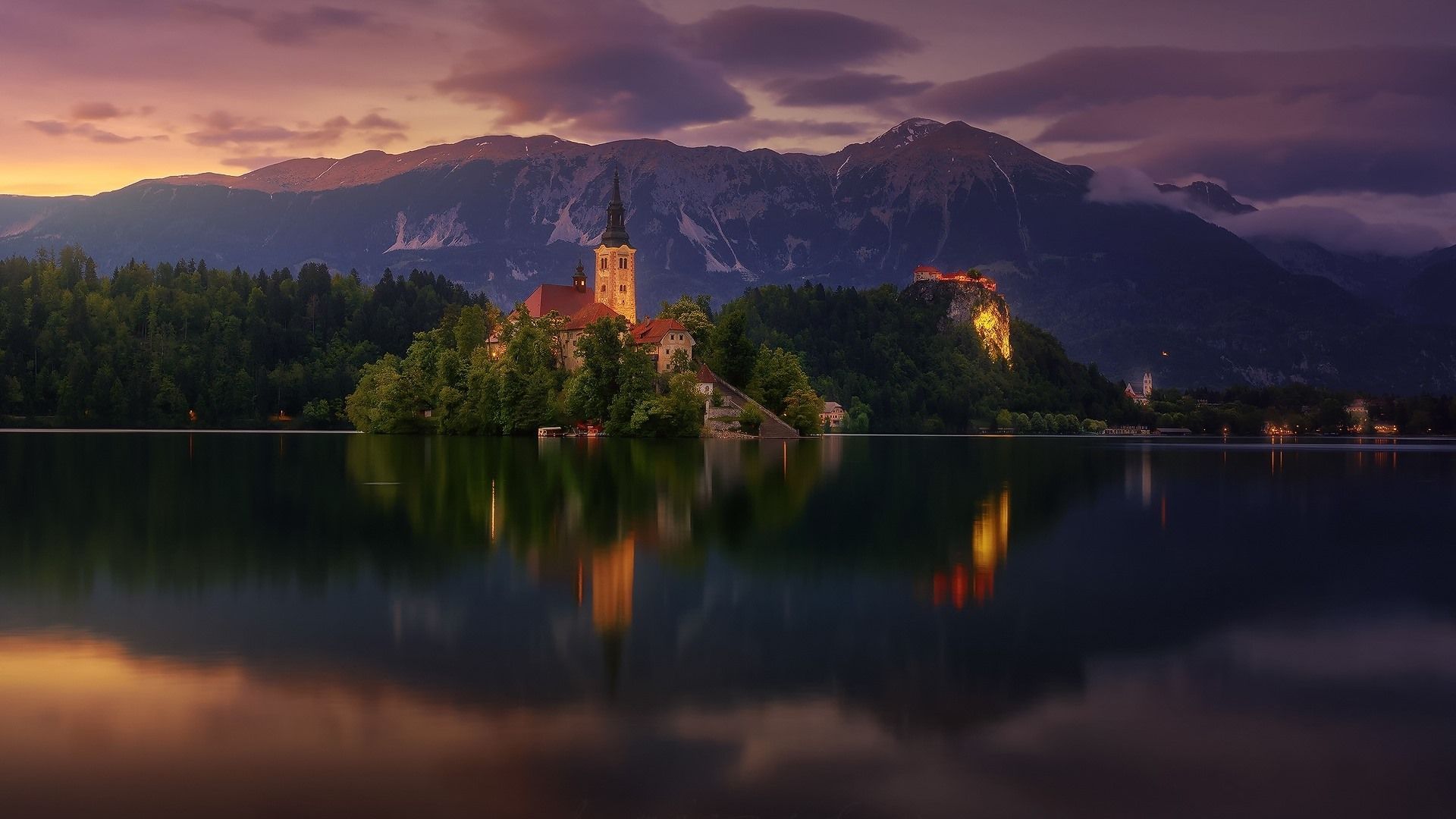 1920x1080 Wallpaper Lake Bled, church, Slovenia, trees, mountains, dusk 1920x1200 HD Picture, Image