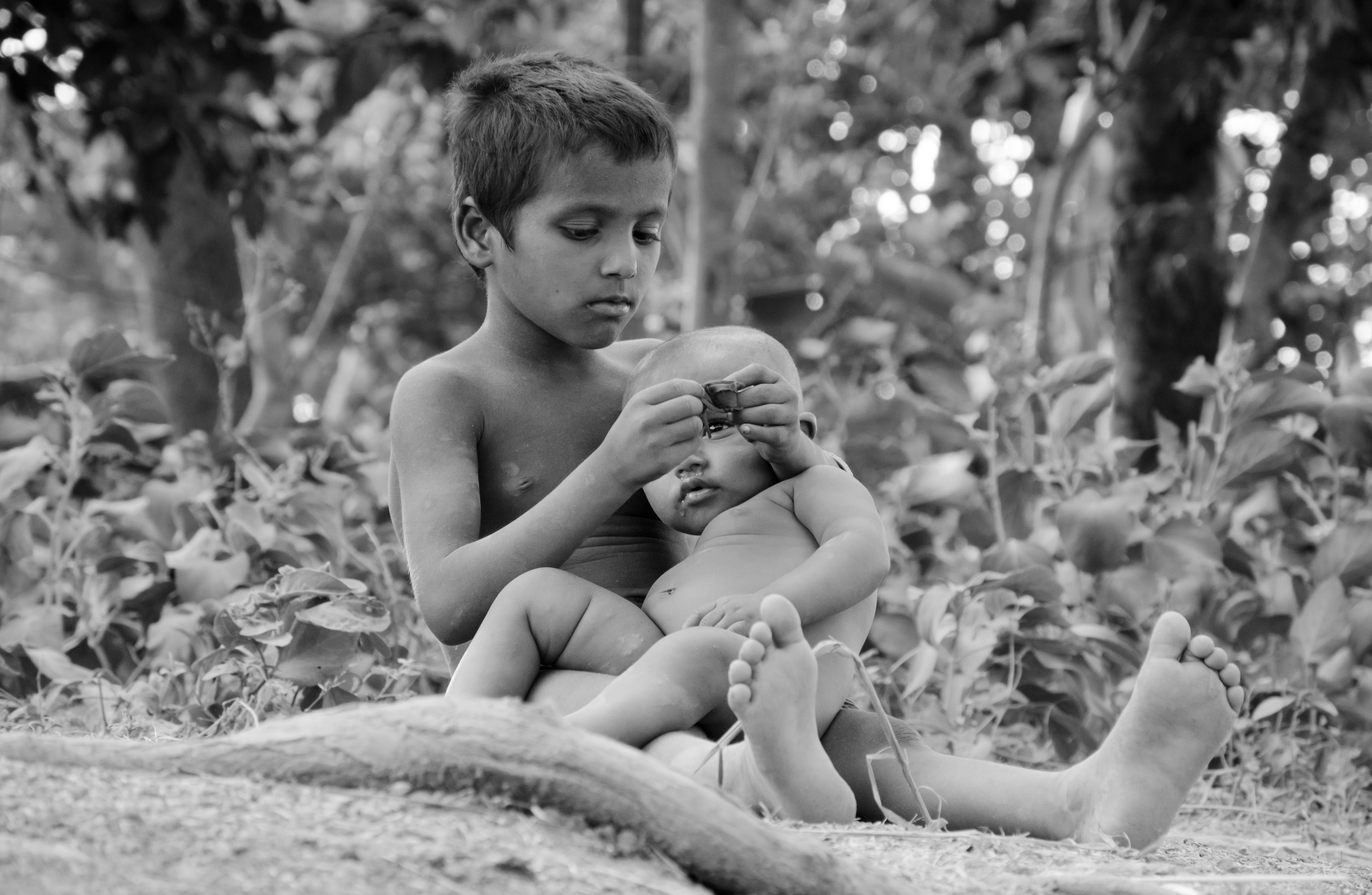 4818x3145 Wallpaper / shirtless, young, grayscale, baby, boys, child, 4K, leisure activity, sitting, childhood, poor, day, lifestyles, full length, focus on foreground, toddler free download