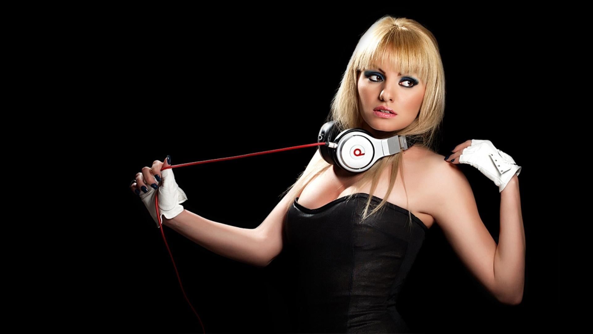 1920x1080 Wallpaper / Alexandra Stan, blond hair, one person, beautiful people, looking at camera, adult, studio shot, 1080P, black background, Beats by Dre, glamour, fashion free download