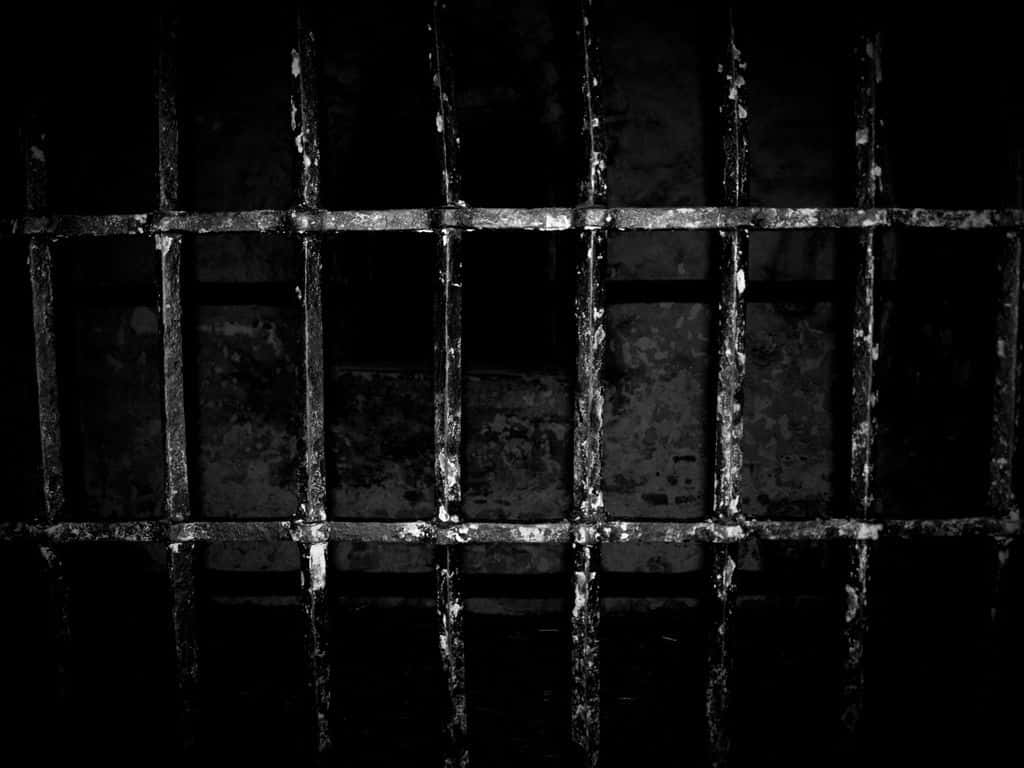 1024x768 Download A Black And White Photo Of A Prison Cell