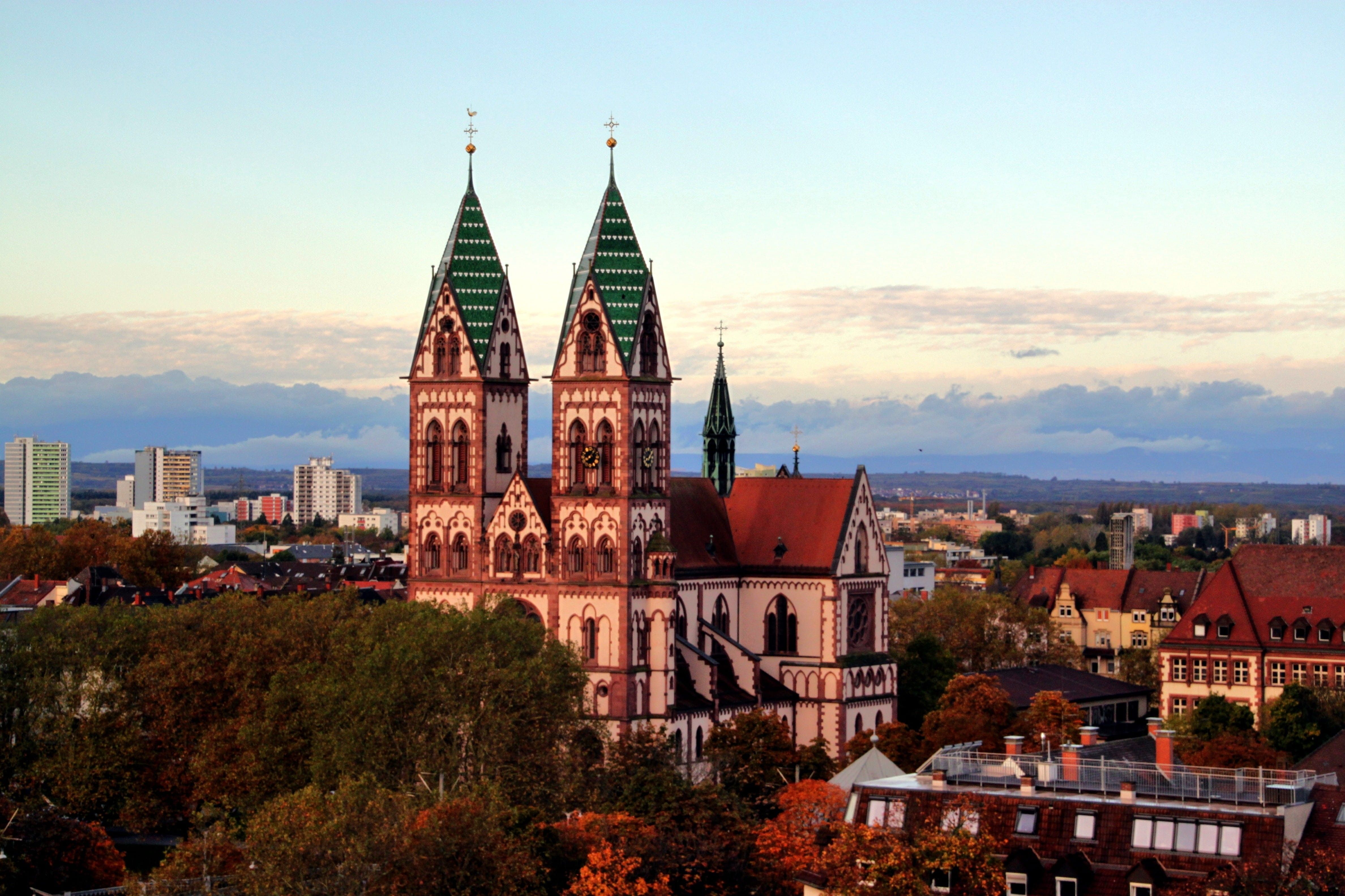 4752x3168 Wallpaper / landscape, place of worship, germany, village, tower, brown, Church, homes, sky, green, Freiburg Im Breisgau, trees, building, outdoors, nature, spirituality free download