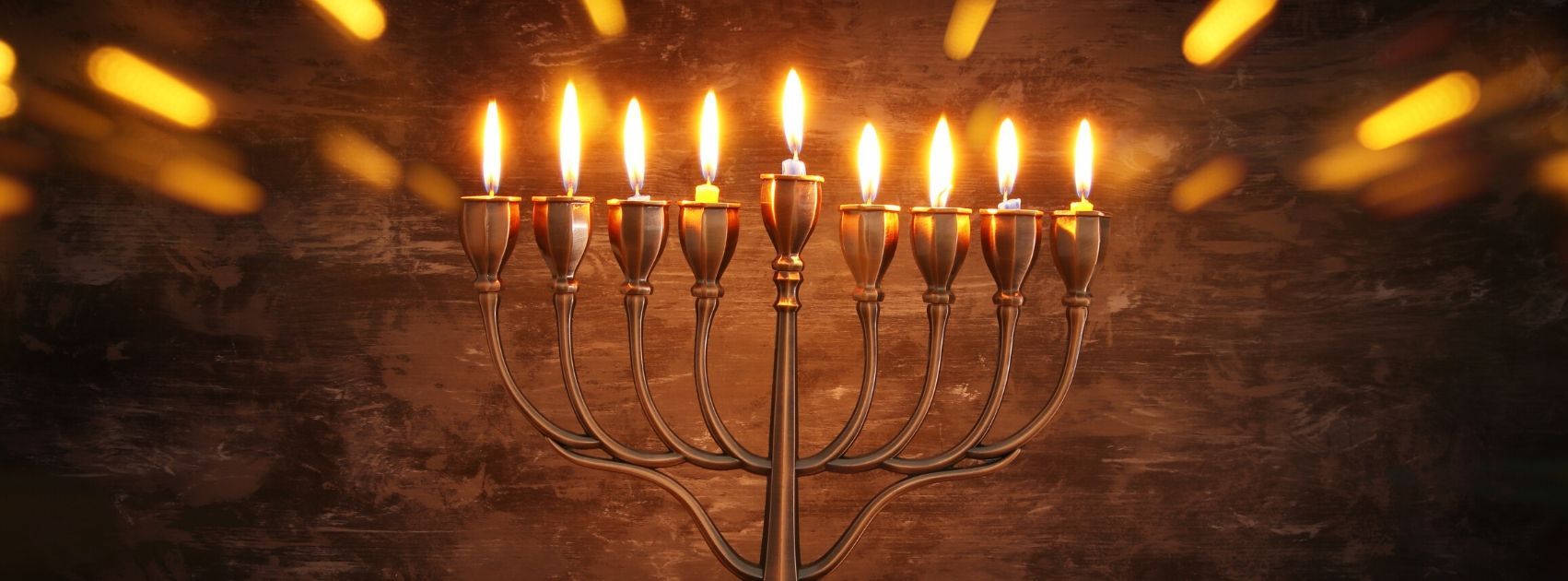 1702x630 What is the Difference between the Hanukkiah and the Menorah?