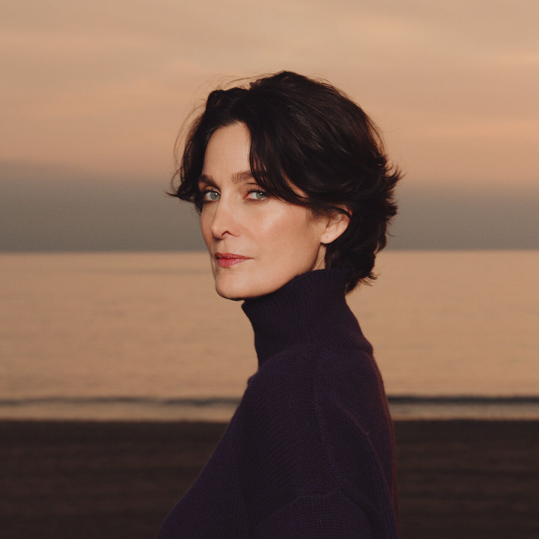 1800x1800 Carrie Anne Moss Resurrects Her 'Matrix' Action Hero Role