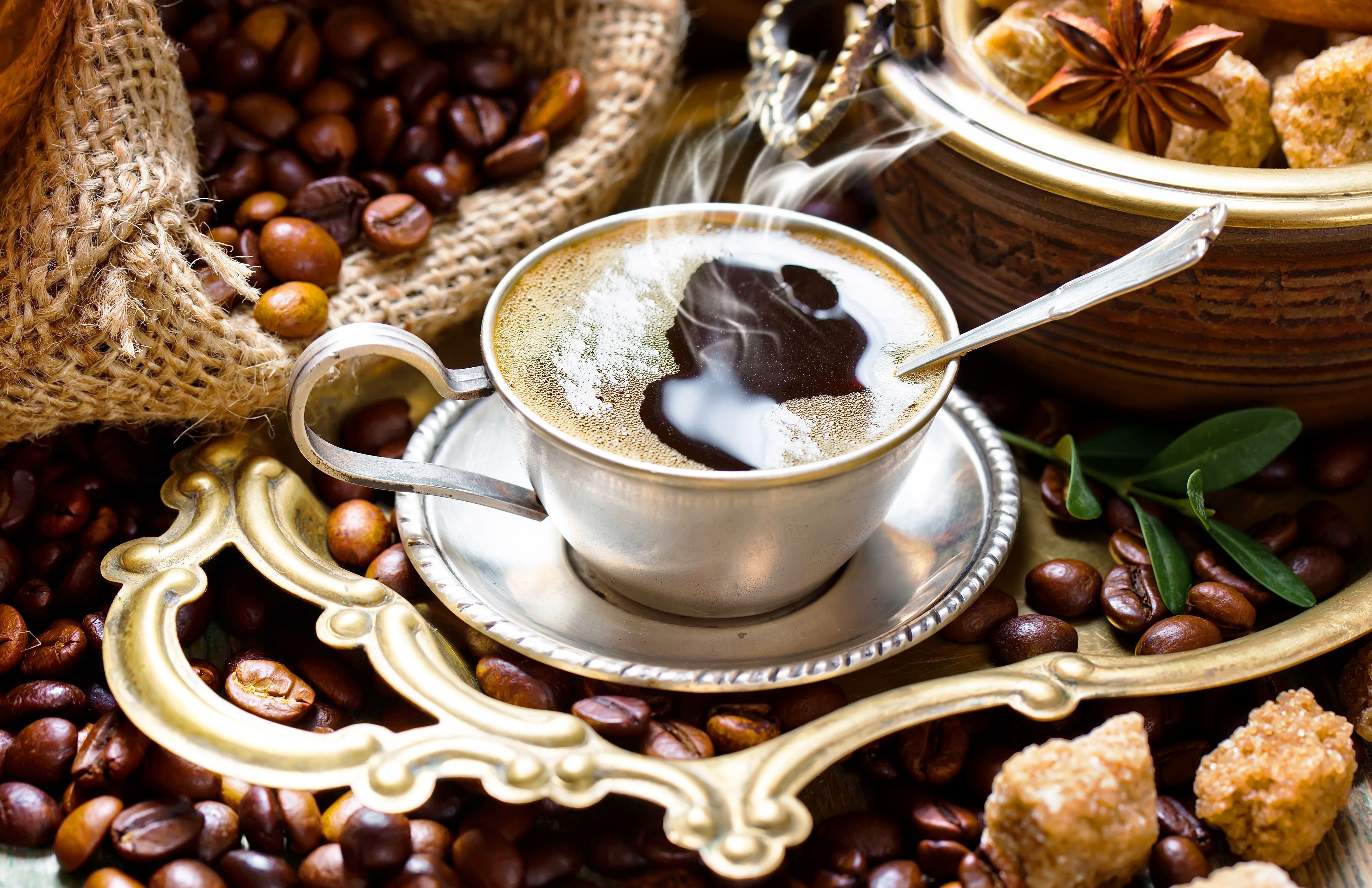 5265x3406 Cup of hot tasty coffee on a table with grains Desktop wallpaper 1600x900