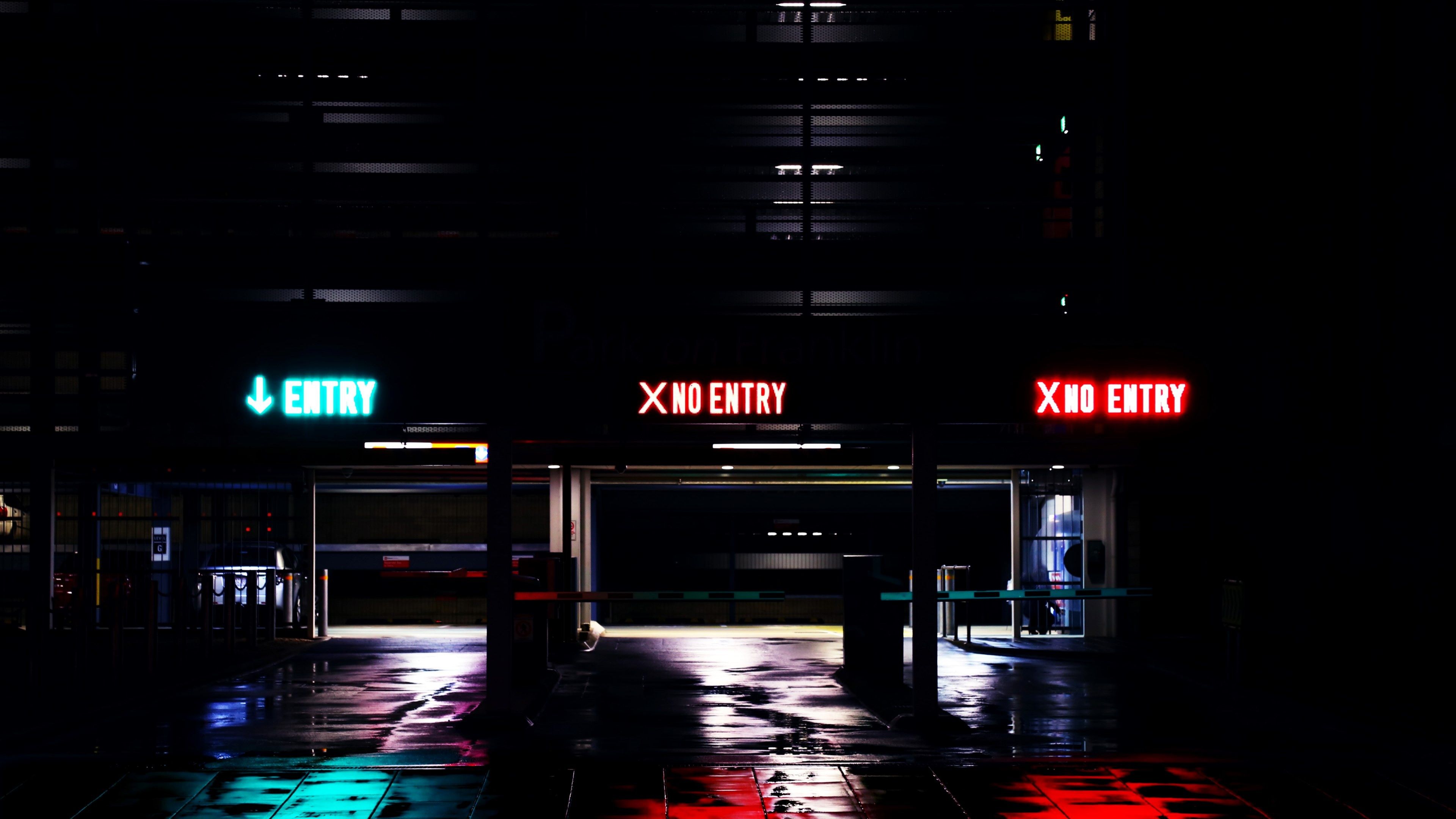 3840x2160 Wallpaper / three entrances to parking garage at night with neon signs that say entry or no entry, entry parking garage night 4k wallpaper free download