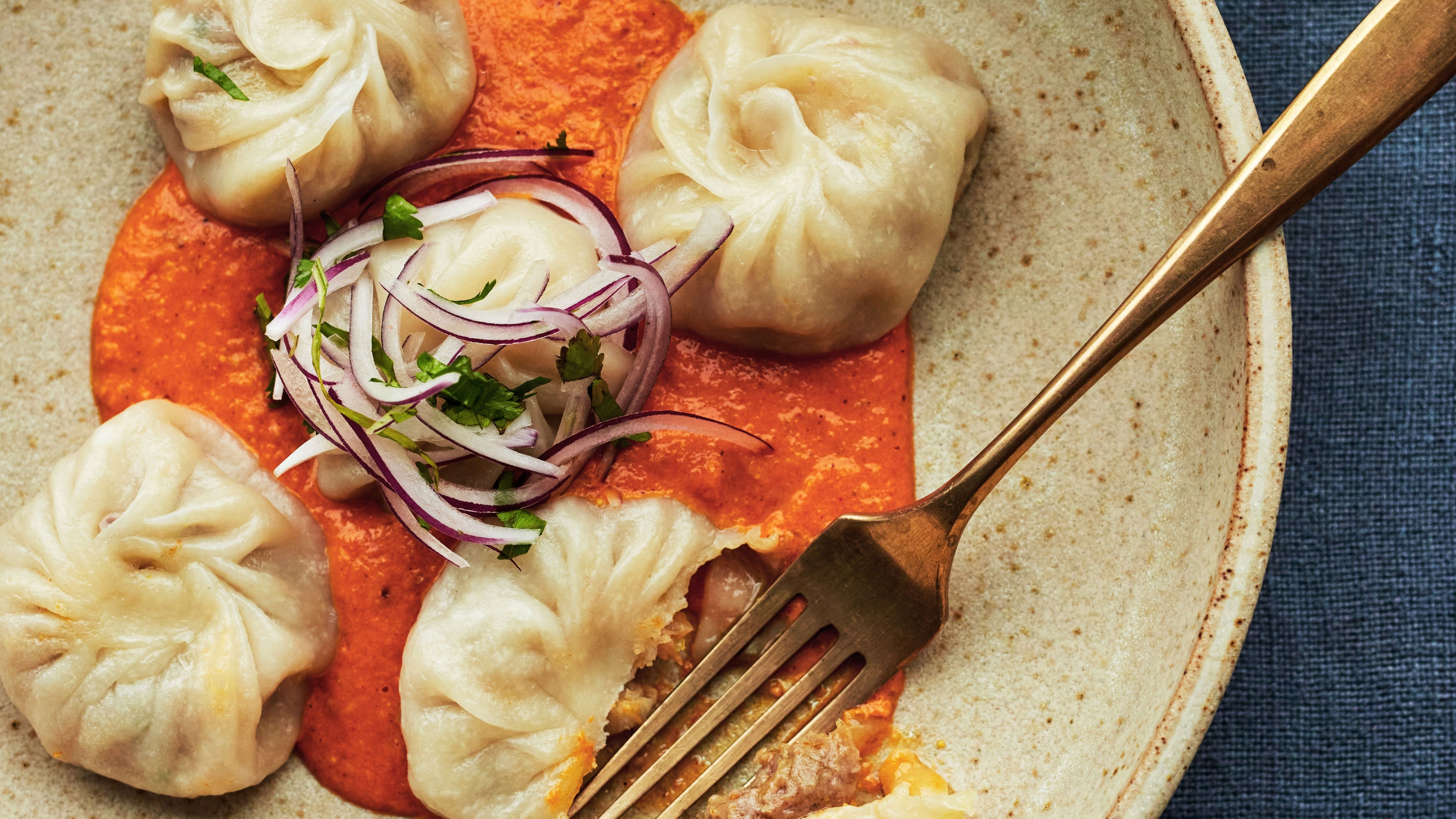 5409x3042 Steamed chicken momos (kukhura ko momo) with ginger, chilli and tomato sesame chutney. House & Garden