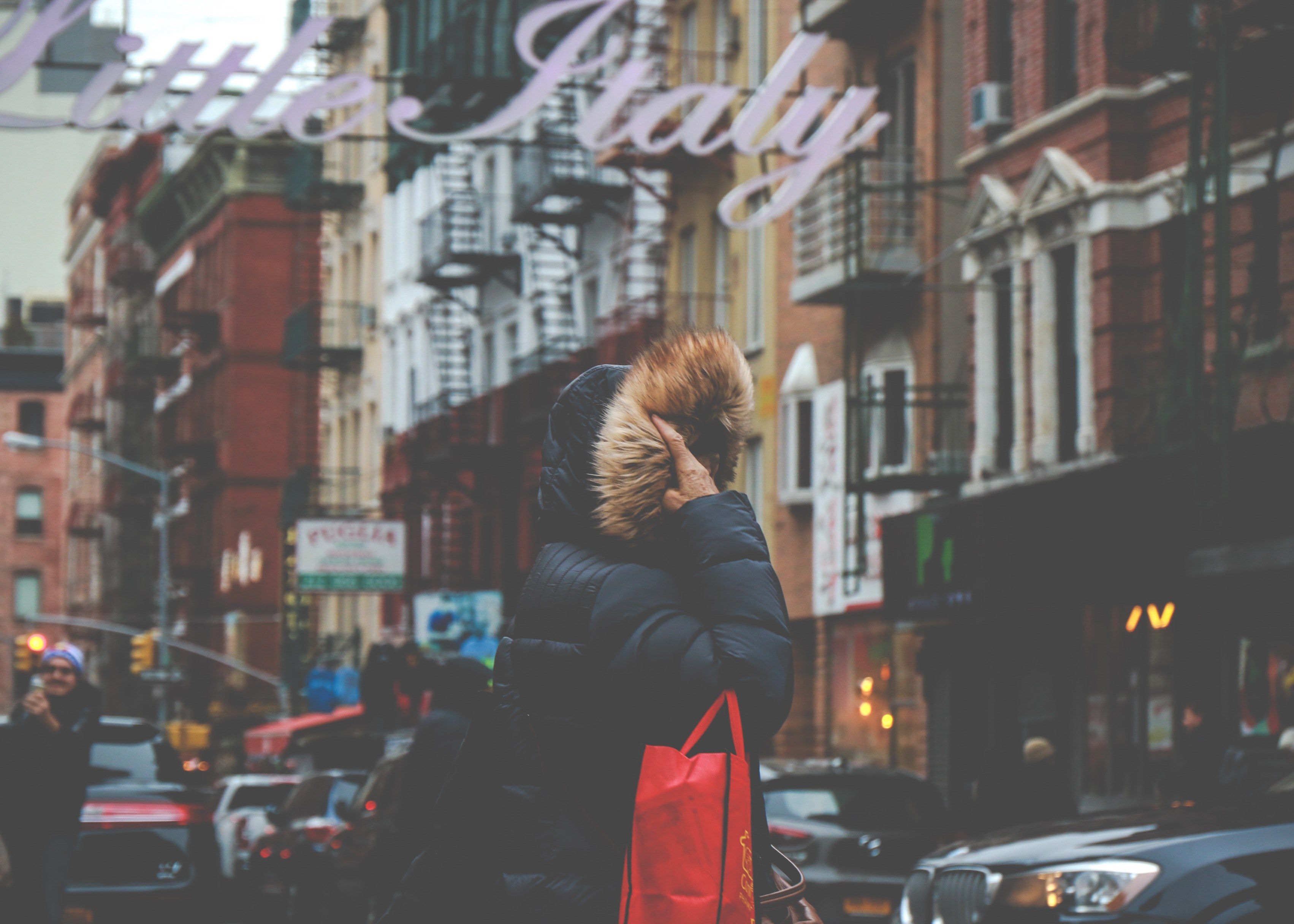 3405x2432 Wallpaper / a person in a fur hood in little italy new york, the wind amp the rain 4k wallpaper free download