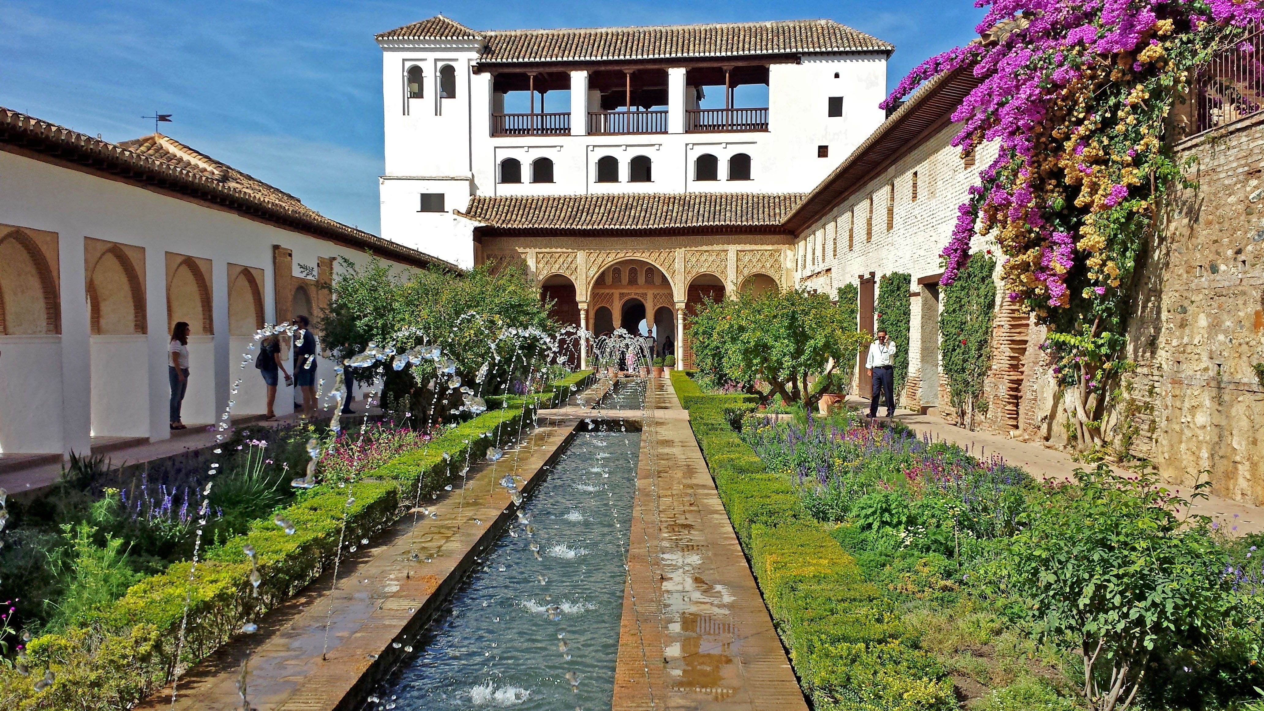 4128x2322 Wallpaper / built structure, growth, generalife, granada, plant, alhambra, house, day, real people, building, flower, sky, nature, courtyard, field, near, architecture free download