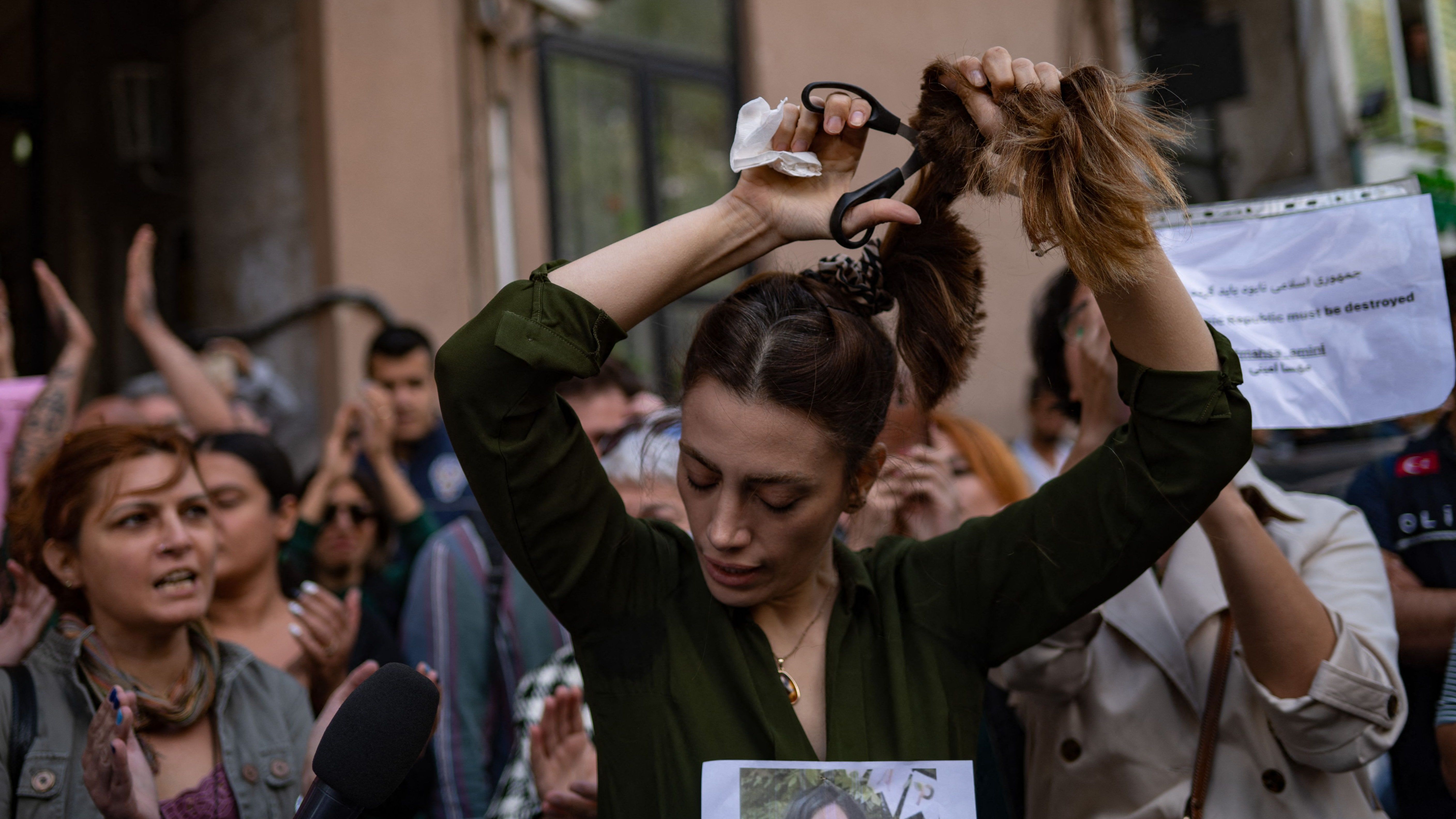 5631x3167 Iranian Women Are Cutting Off Their Hair to Protest the Death of Mahsa Amini
