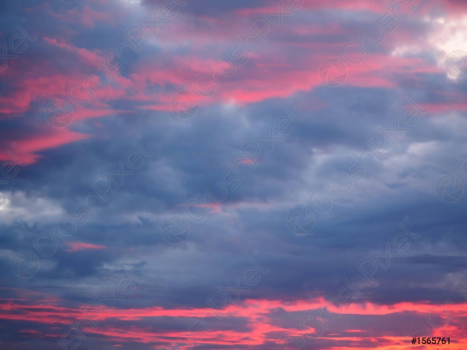 1500x1125 Thunderclouds on a sky background illuminated by the suns rays
