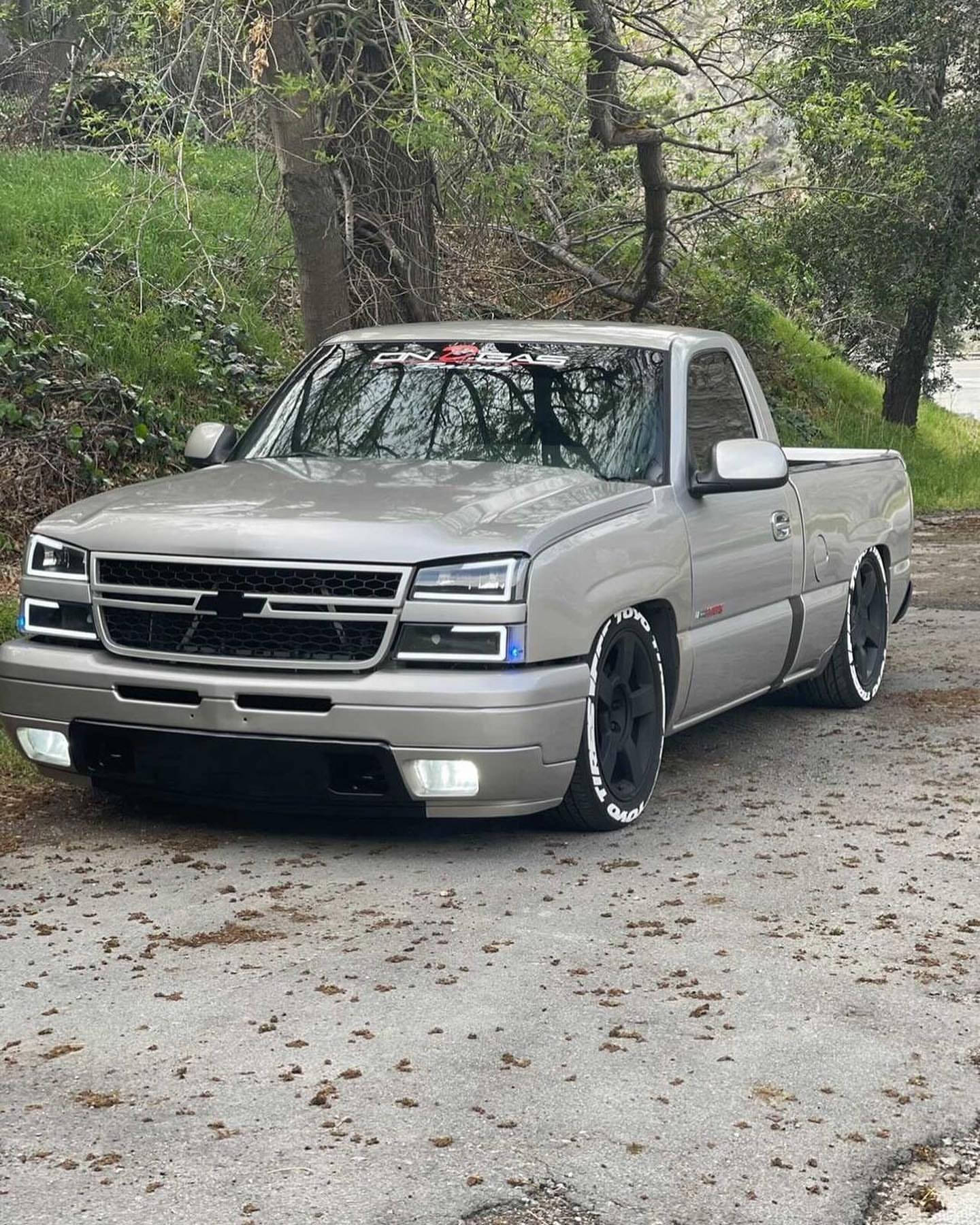 1440x1800 Download Parked Gray Dropped Truck Wallpaper