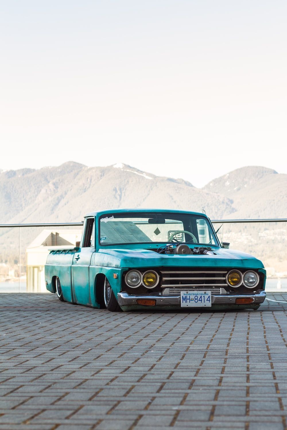 1000x1500 Teal single cab pickup truck photo