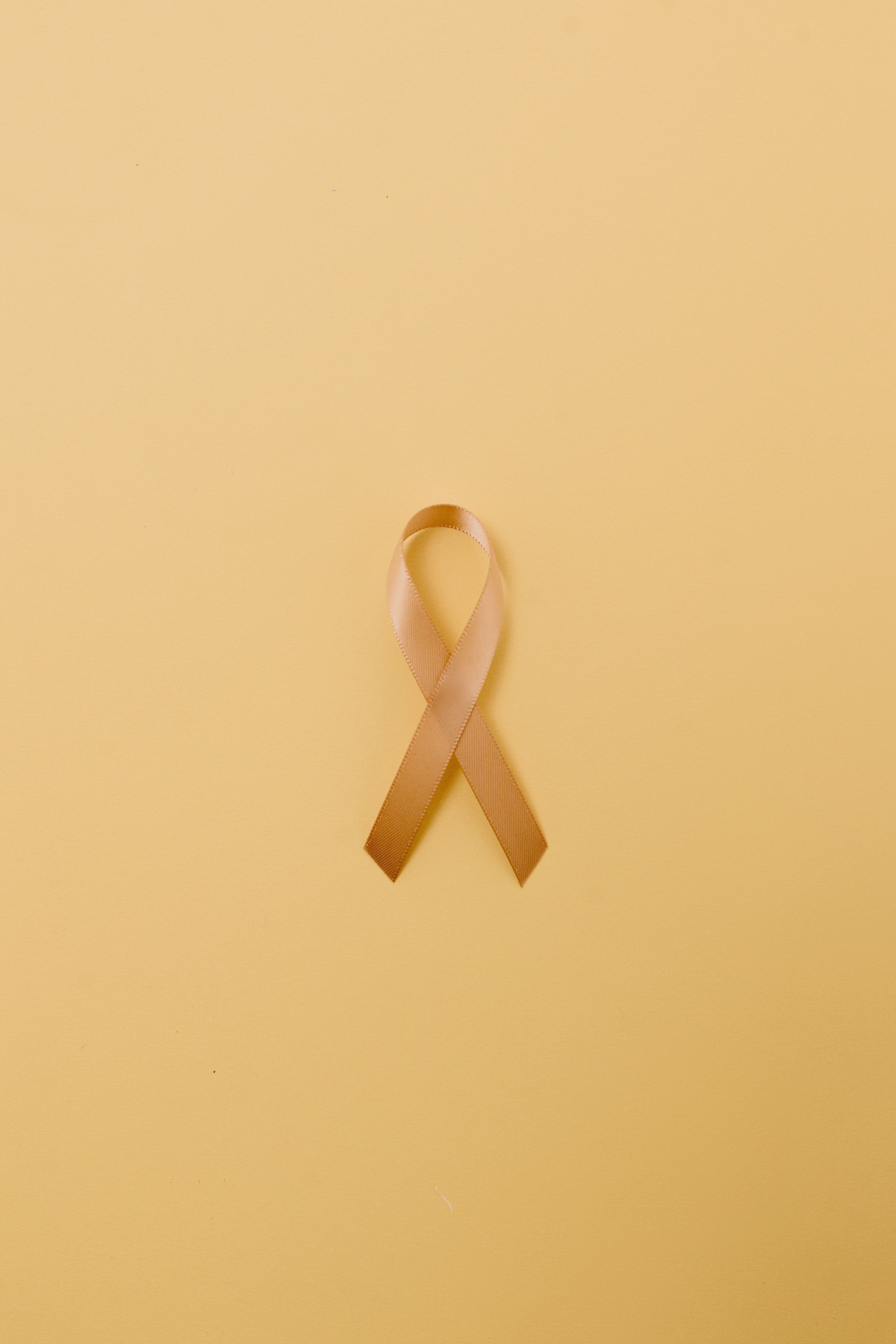 4168x6252 A Gold Ribbon on a White Surface · Free