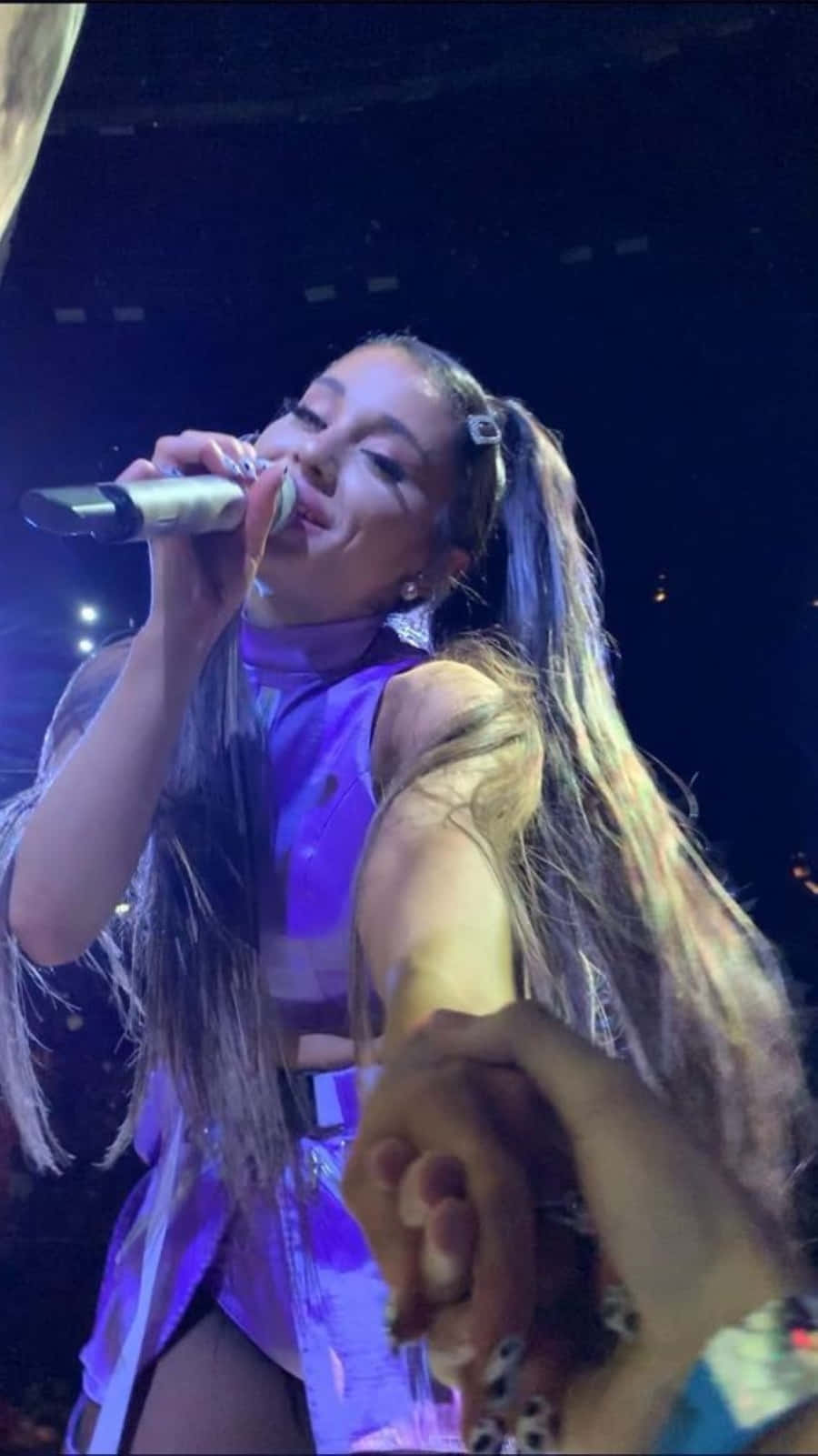 900x1601 Download Ethereal Ariana Grande Portrait Wallpaper