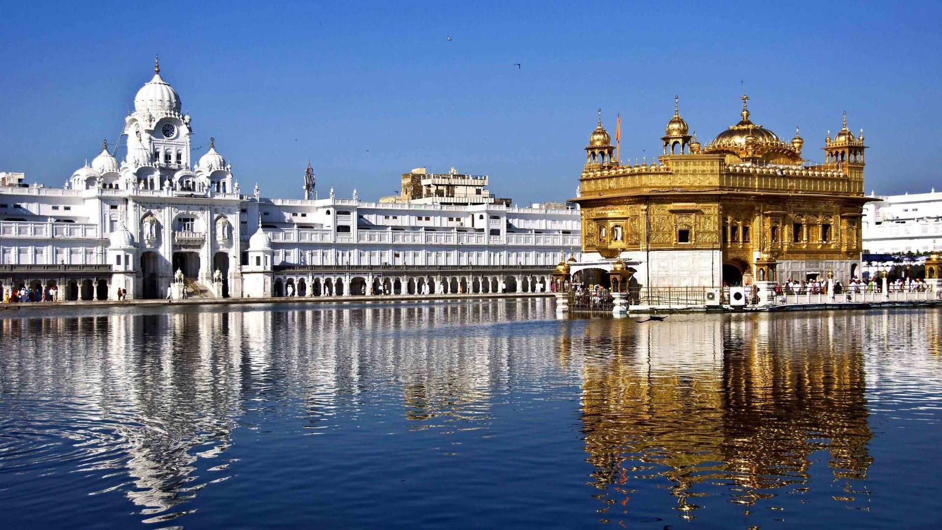 1920x1080 View of the Golden Temple Harmandir Sahib near the water, India Desktop wallpaper 1920x1080