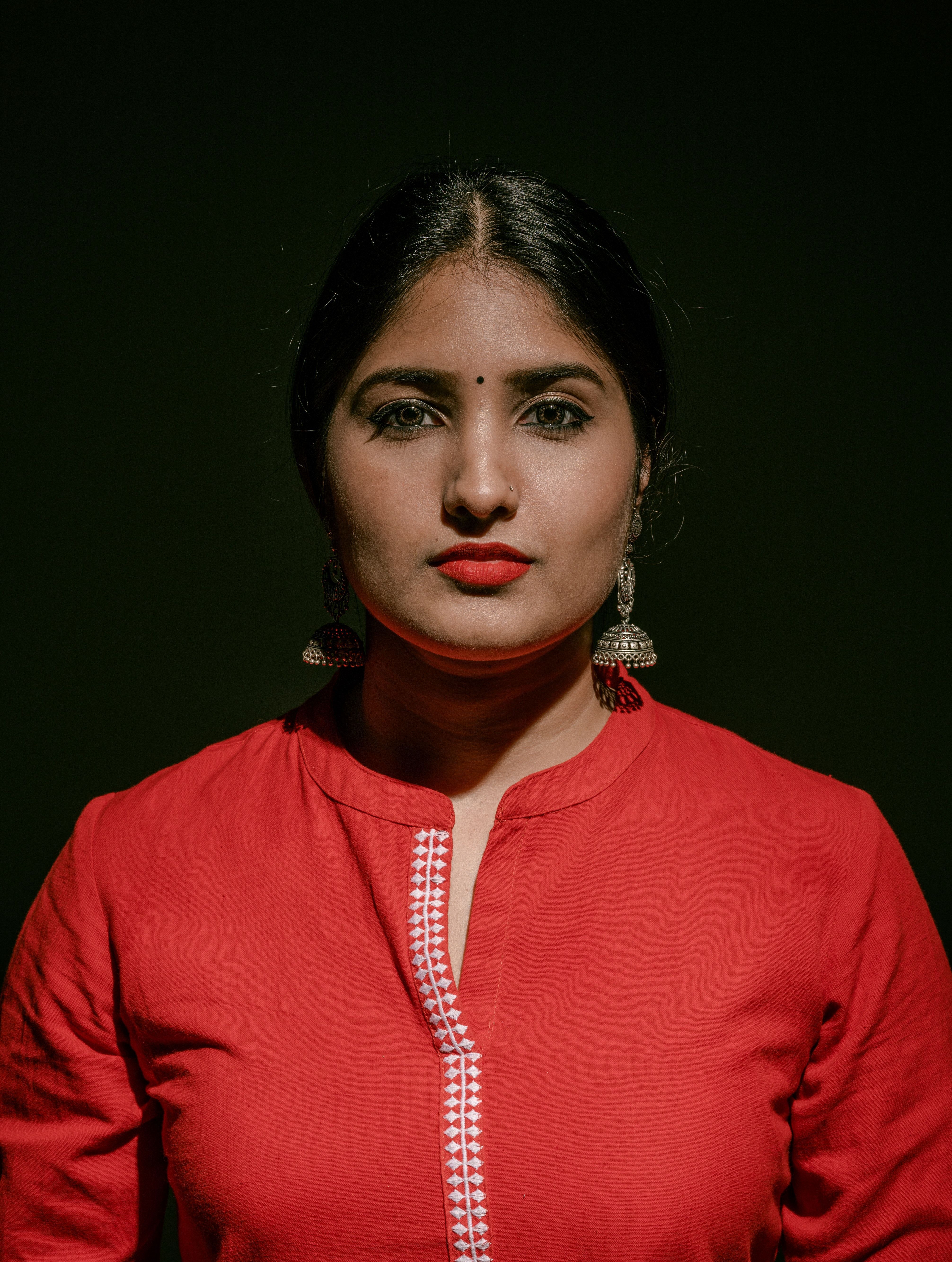 4024x5333 Woman in Red Top Wearing Silver Earrings · Free