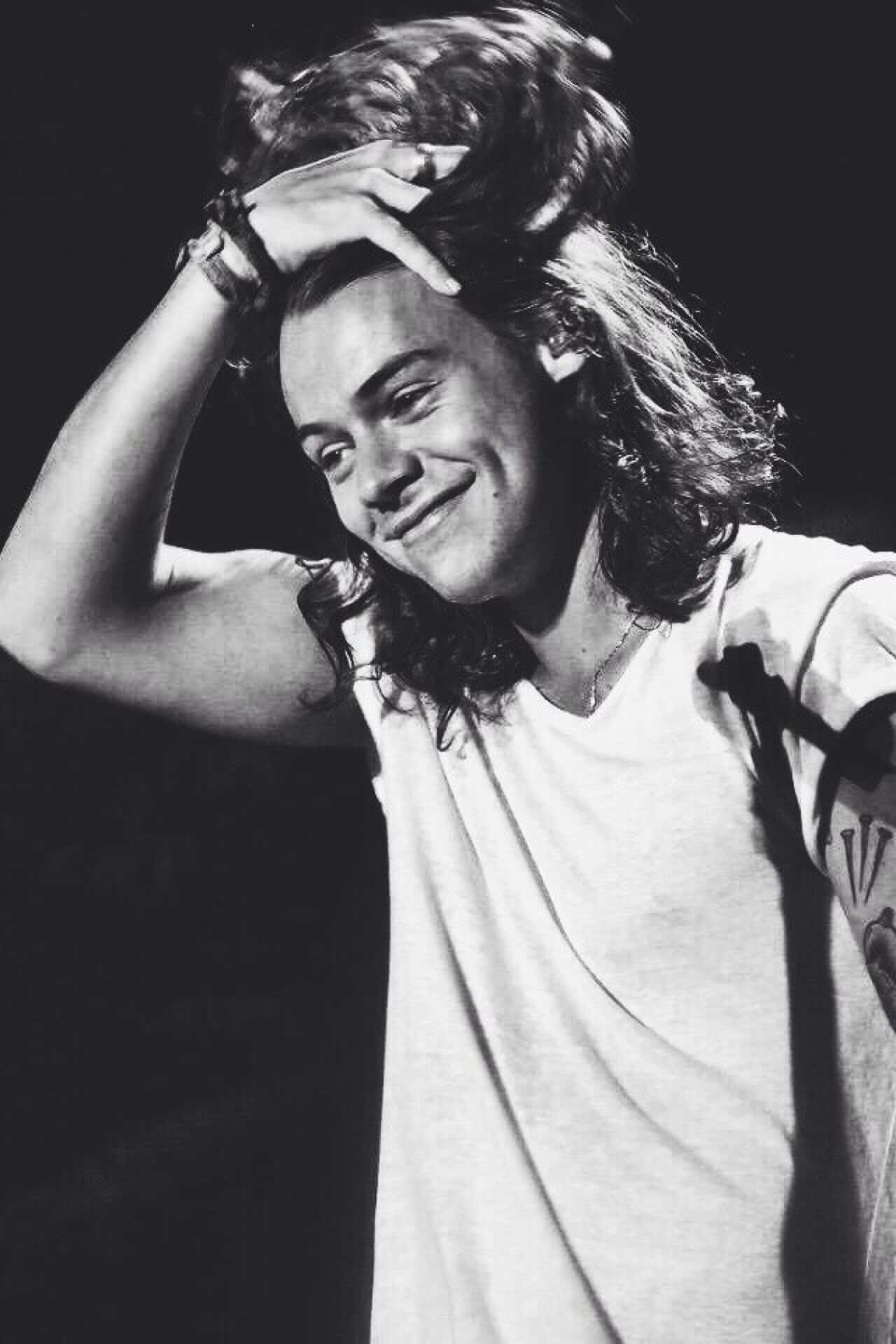 1280x1920 Download Harry Styles looking suave in classic black and white. Wallpaper