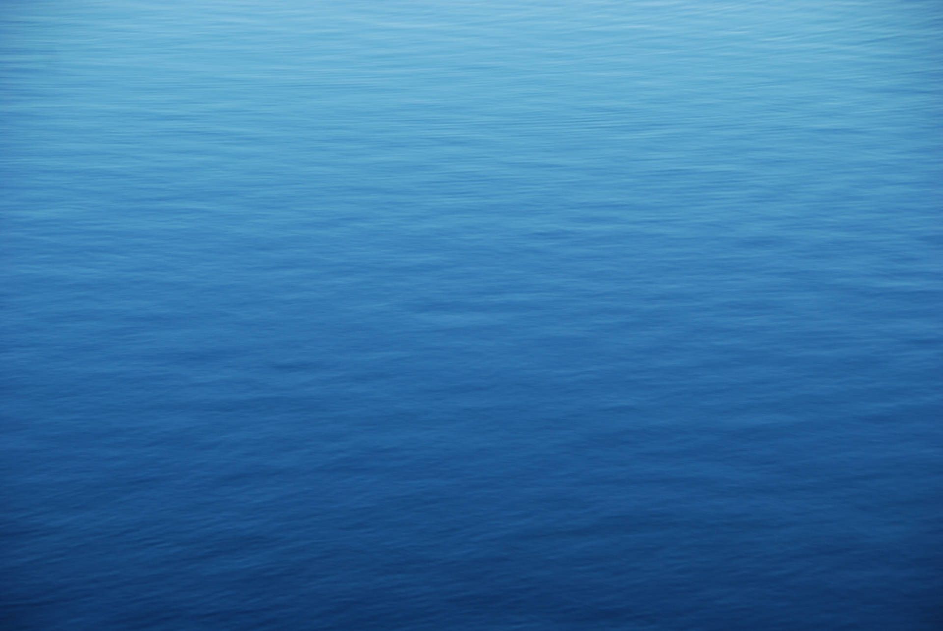 1920x1285 Download View from Above of the Calm Blue Ocean Water Wallpaper