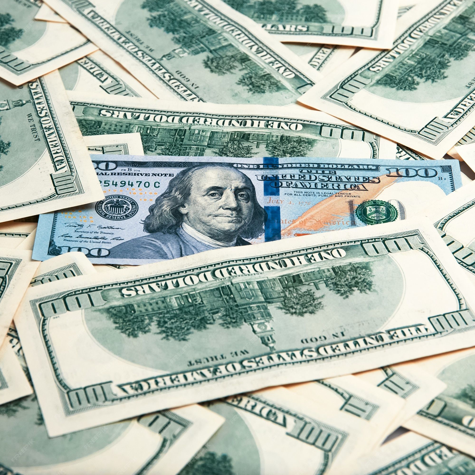 2000x2000 Premium Photo. Cash of hundred dollar bills, dollar background image. a pile of one hundred us banknotes