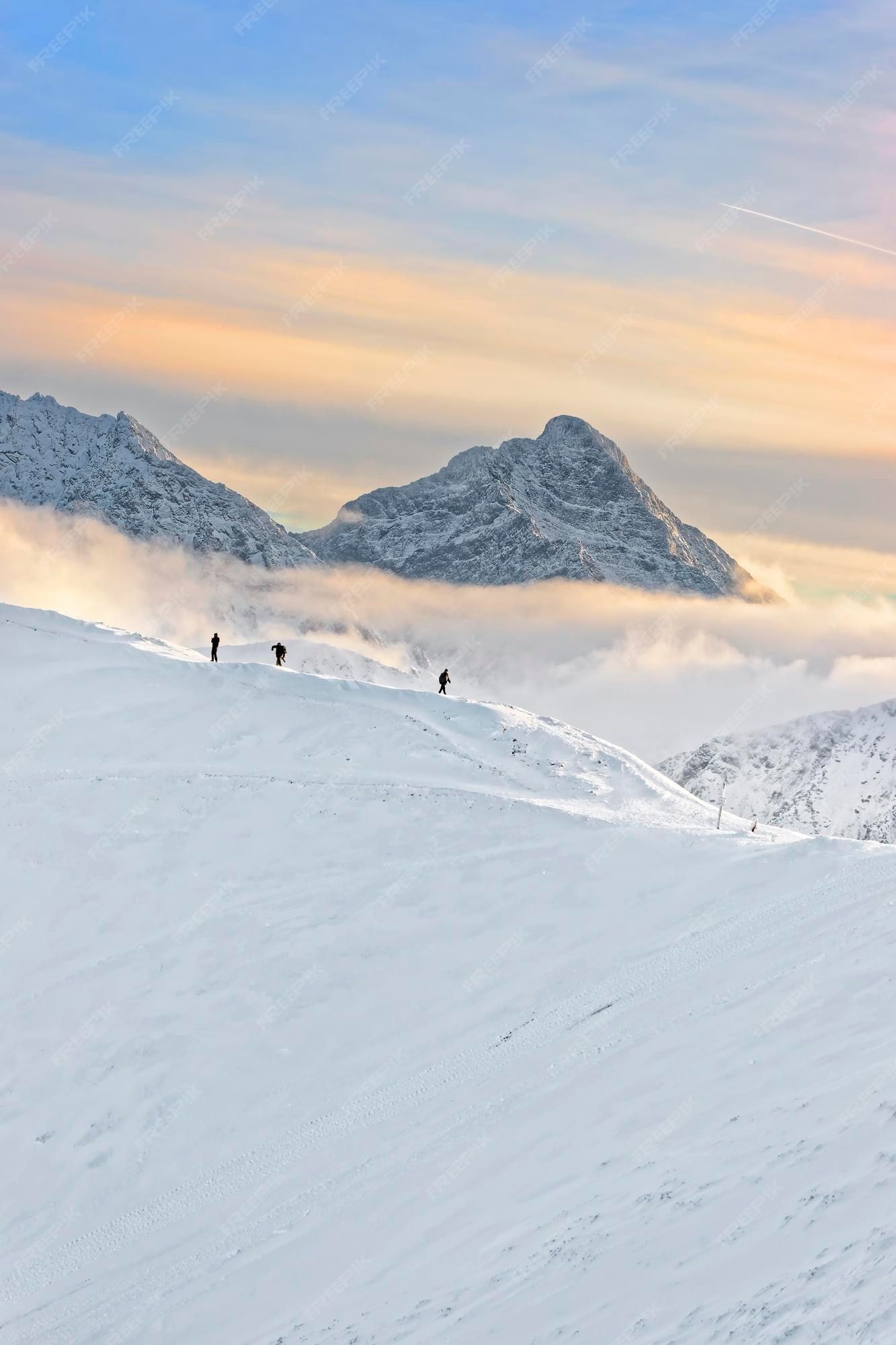 1333x2000 Premium Photo. People on the top of kasprowy wierch of zakopane in tatras in winter. zakopane is a town in poland in tatra mountains. kasprowy wierch is a mountain in zakopane