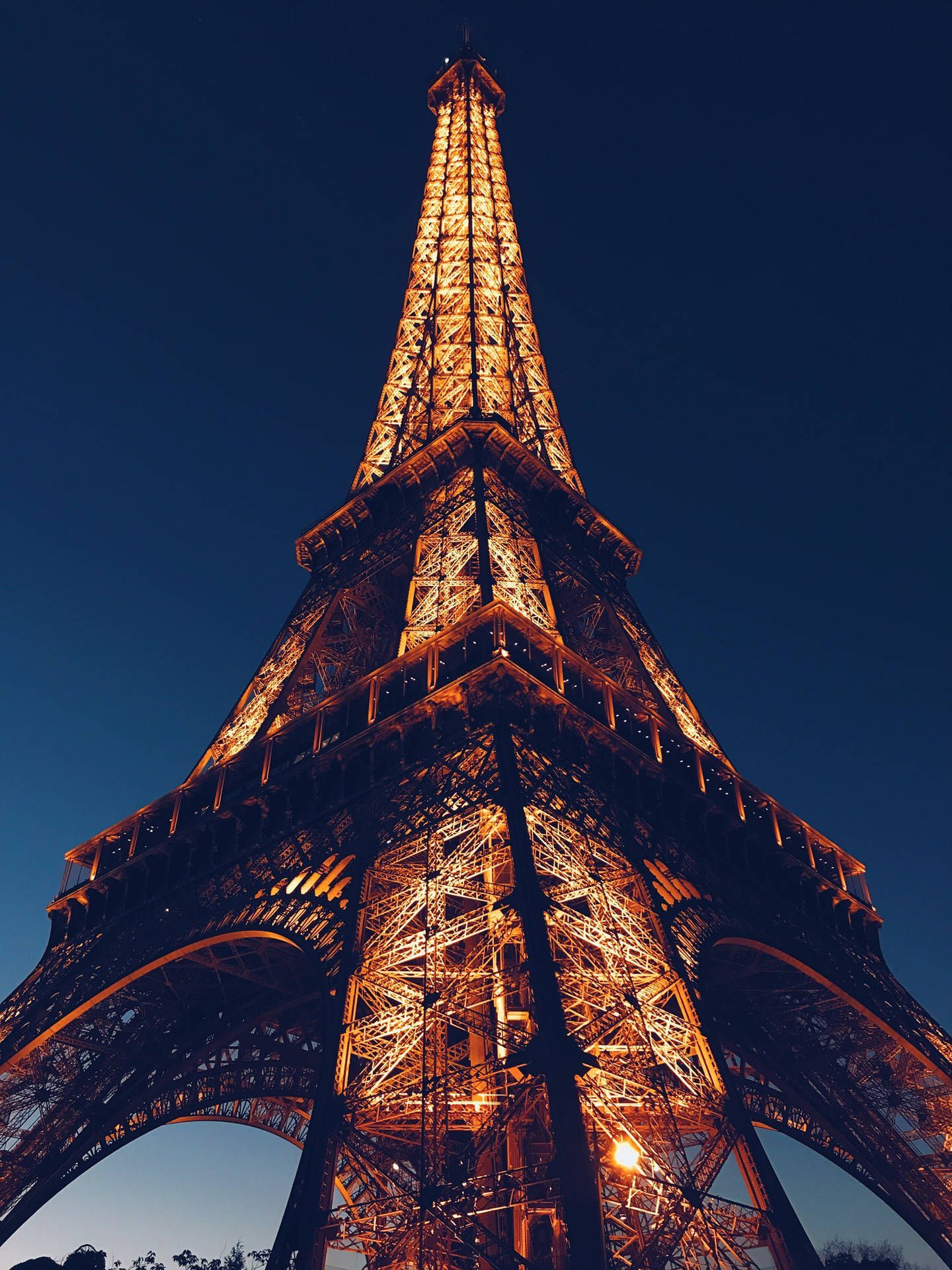 1440x1920 Download The Eiffel Tower Glittering in the Night Wallpaper