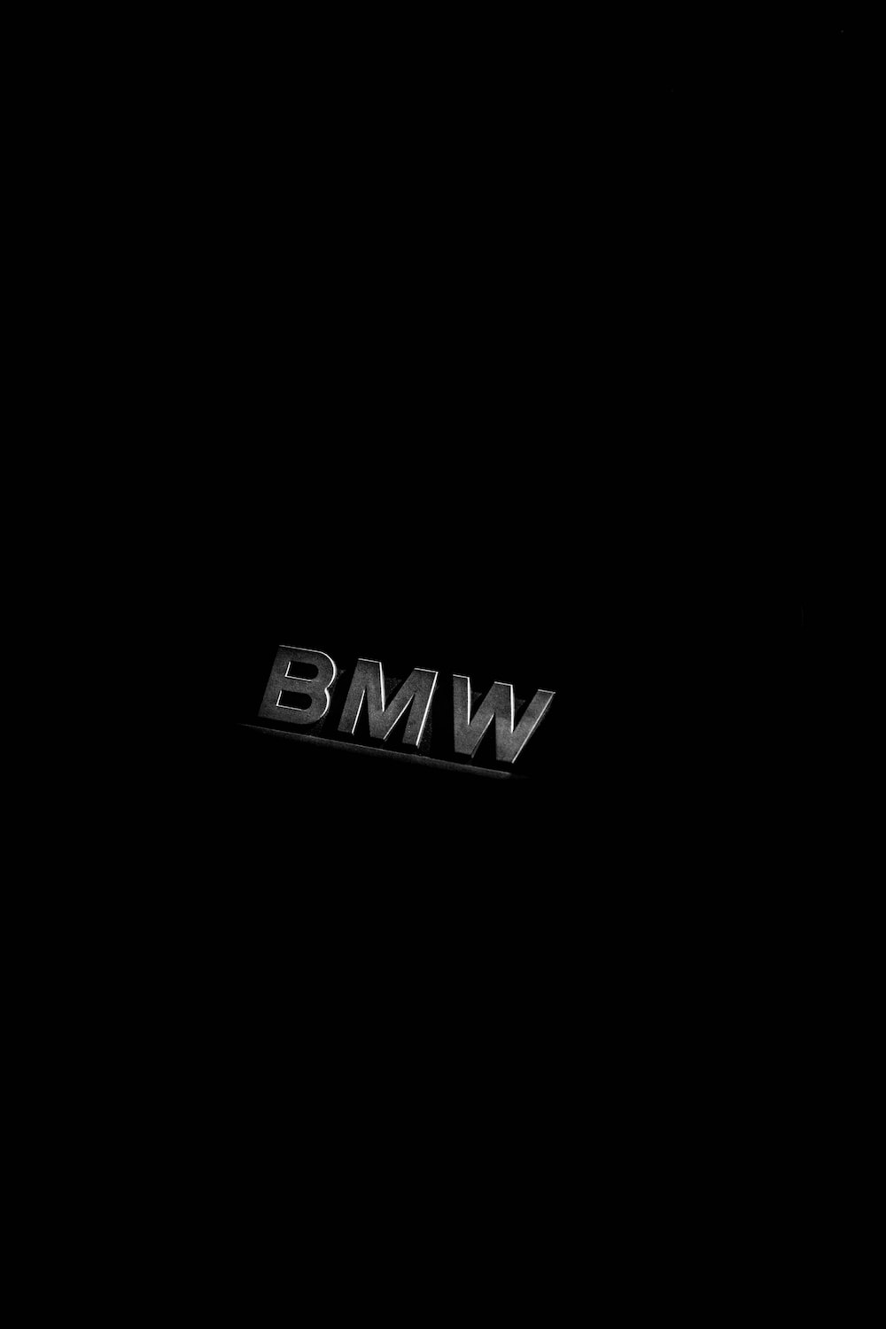 1000x1500 BMW emblem on black background photo