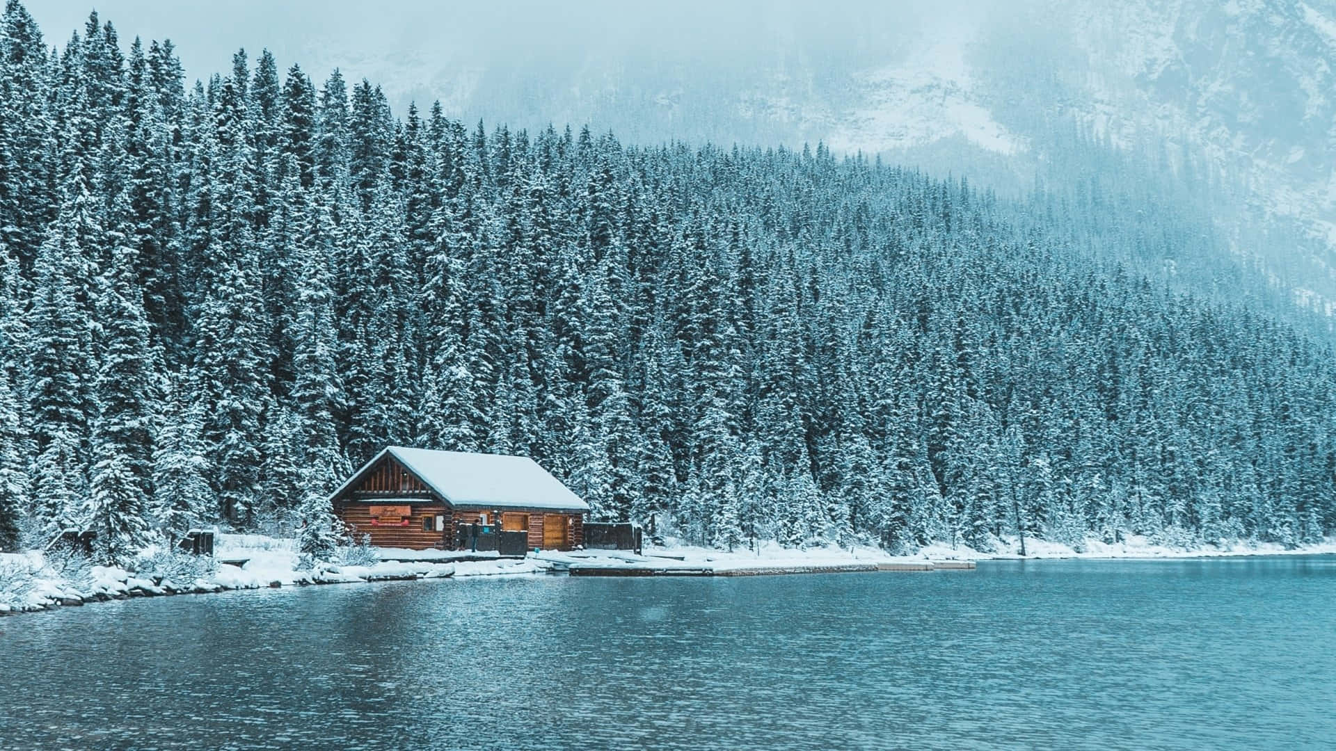 1920x1080 Download Cabin Snow Covered By The Lake Wallpaper