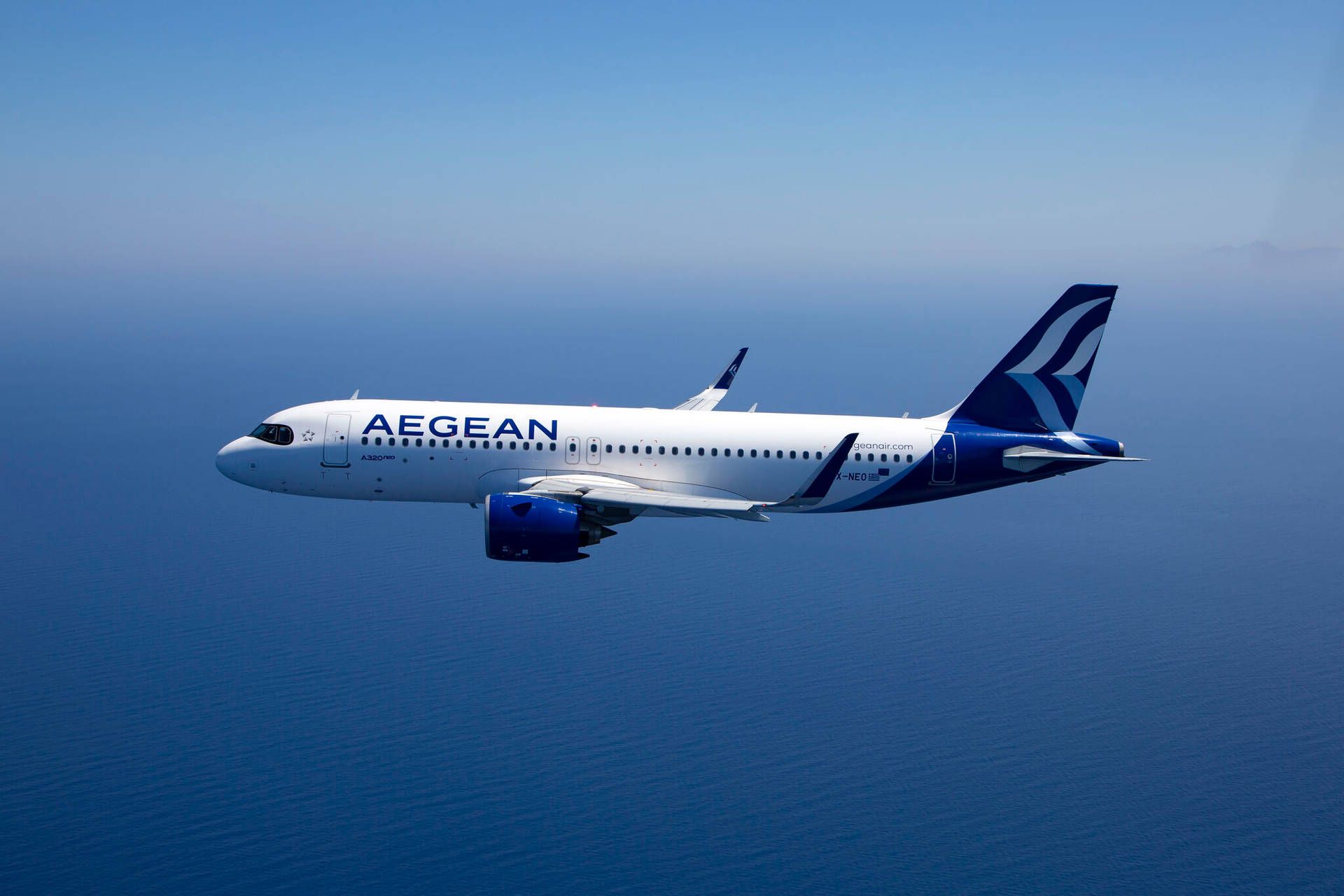 1920x1280 Download Majestic Aegean Airlines A320neo Jet Takes Flight against Azure Sky Wallpaper