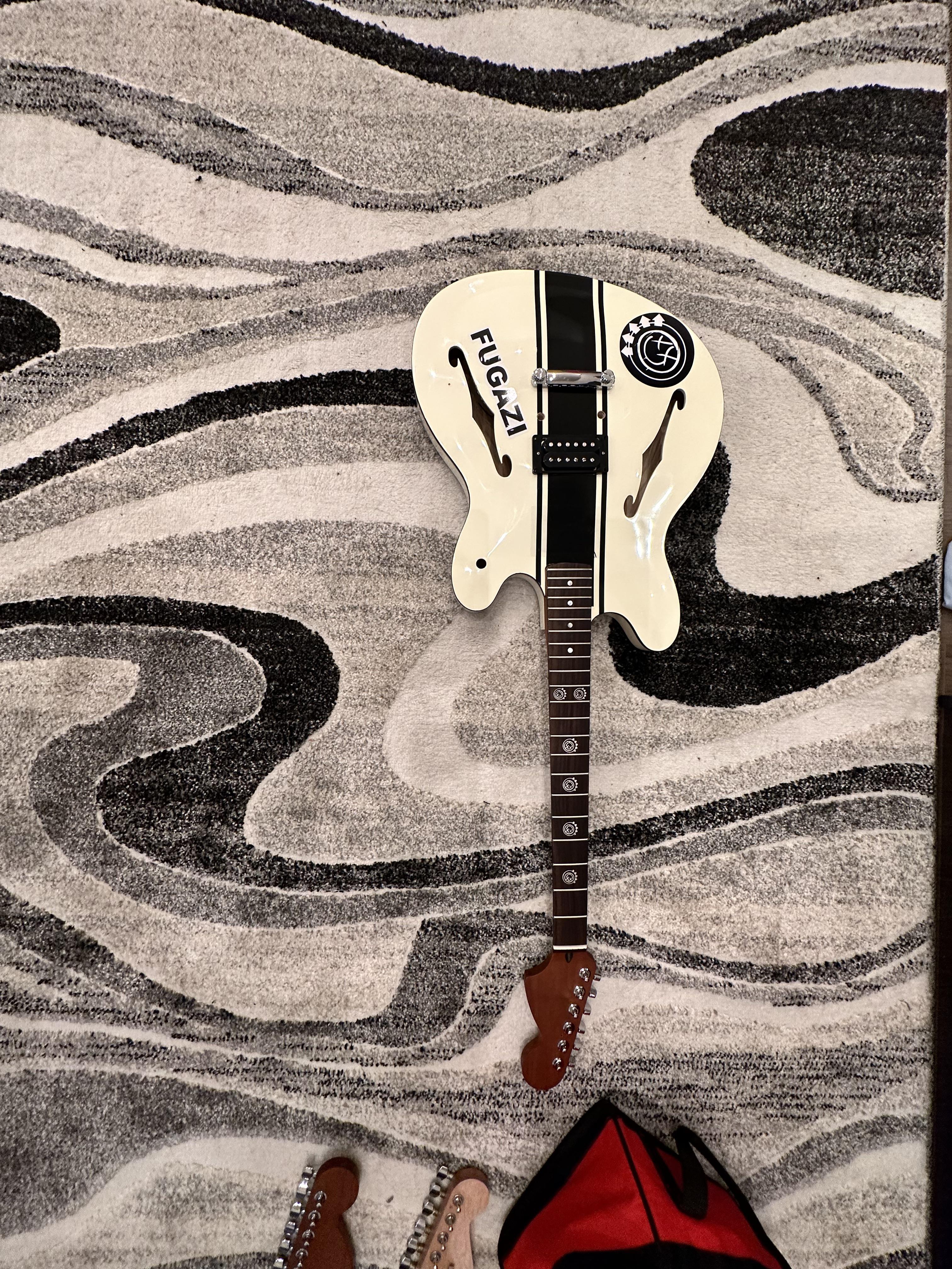 3024x4032 Time to place a perm shim down on the neck, and we're off! Excited to share the next starcaster build!
