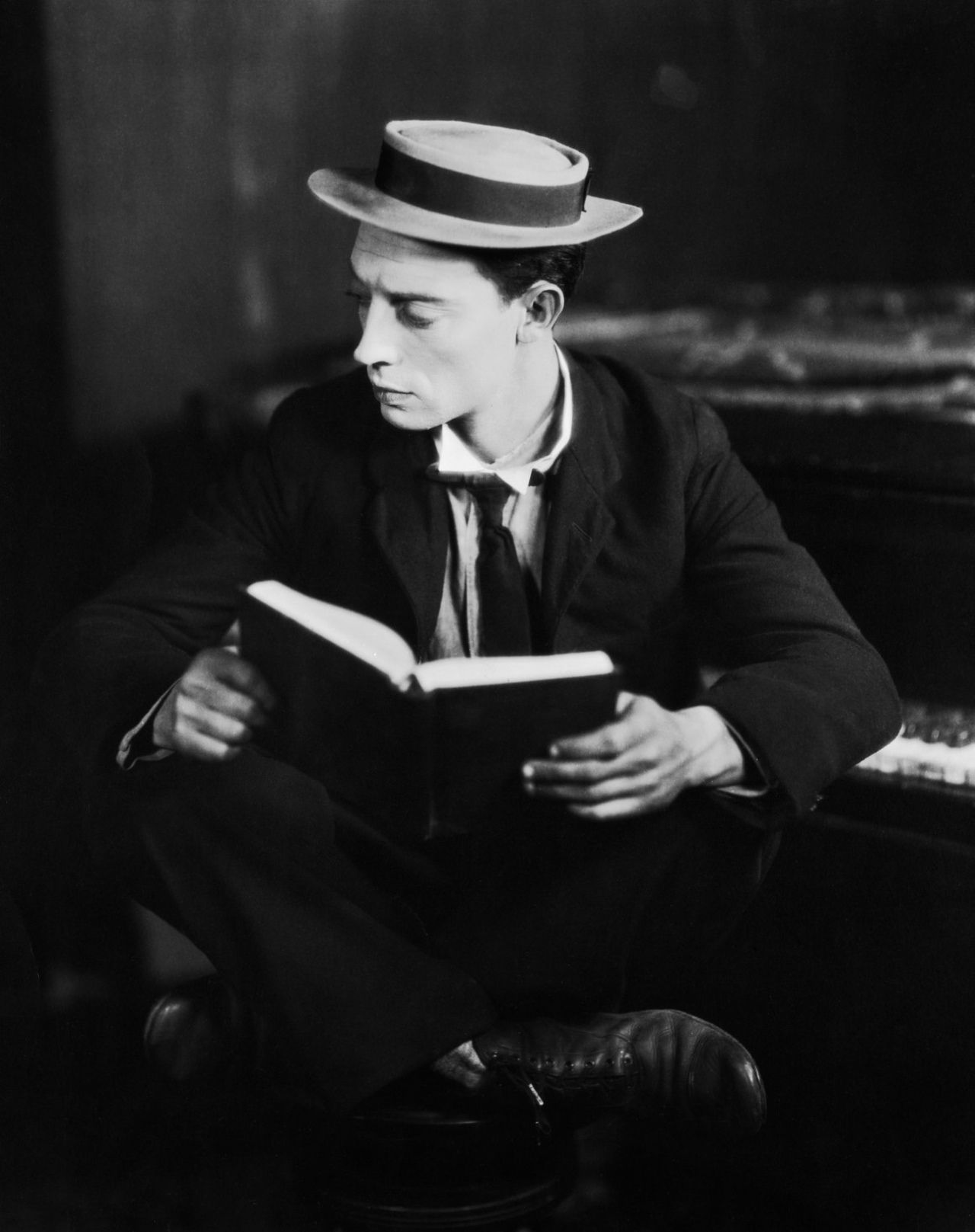 1280x1617 Buster Keaton reading. When, at six months, he tumbled down a flight of stairs unharmed, he was given the name &;Bu. Silent movie, Comedians, American actors