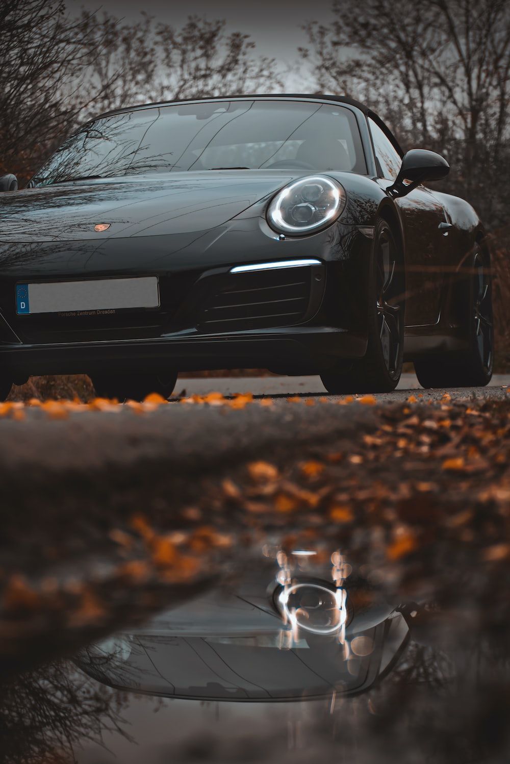 1000x1498 Black porsche 911 on road photo