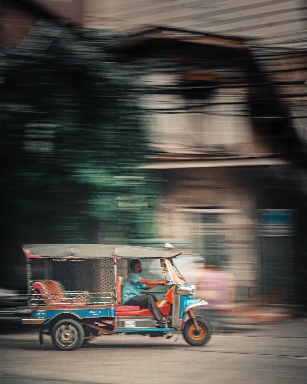 1000x1250 People riding on red and white auto rickshaw on road during daytime photo
