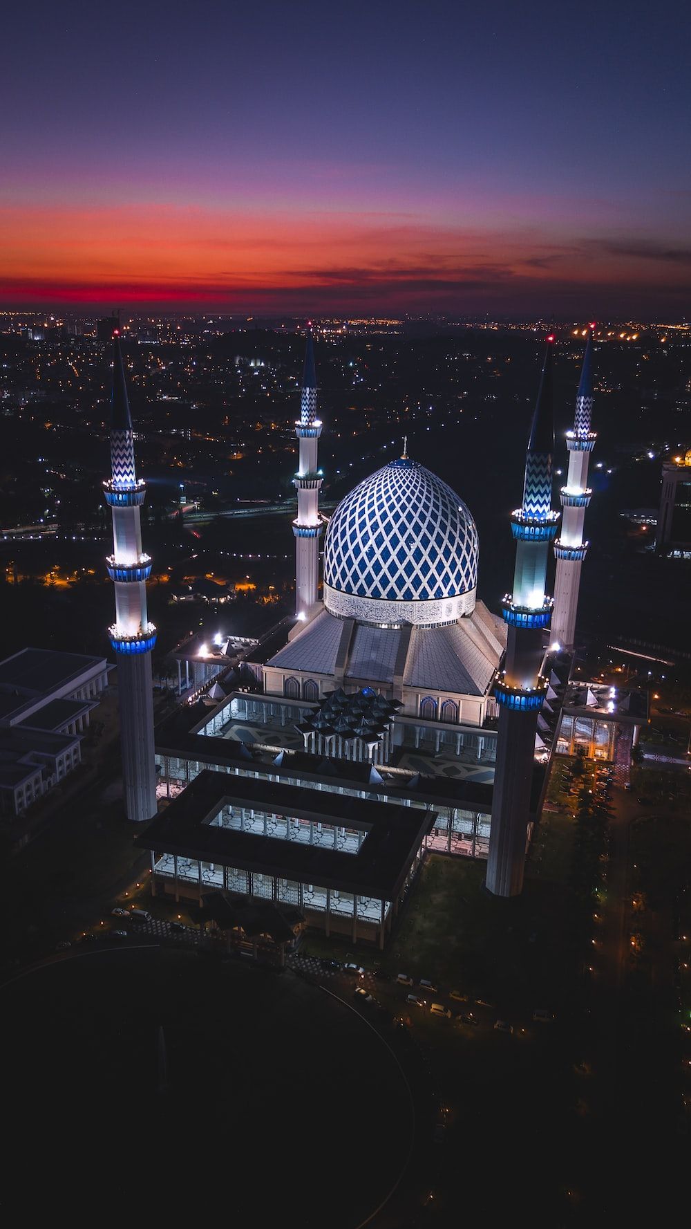 1000x1777 White And Blue Dome Concrete Building With 4 Towers During Night Time Photo