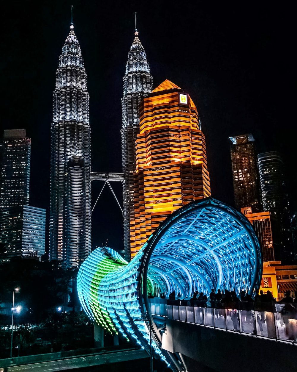 1000x1250 Lighted city buildings during night time photo