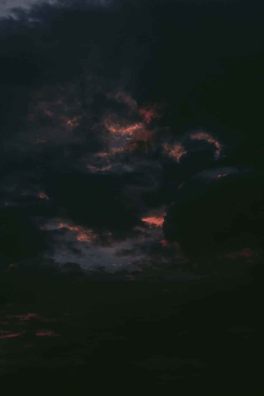 1000x1500 Download Dark, ominous clouds blocking out the sun Wallpaper