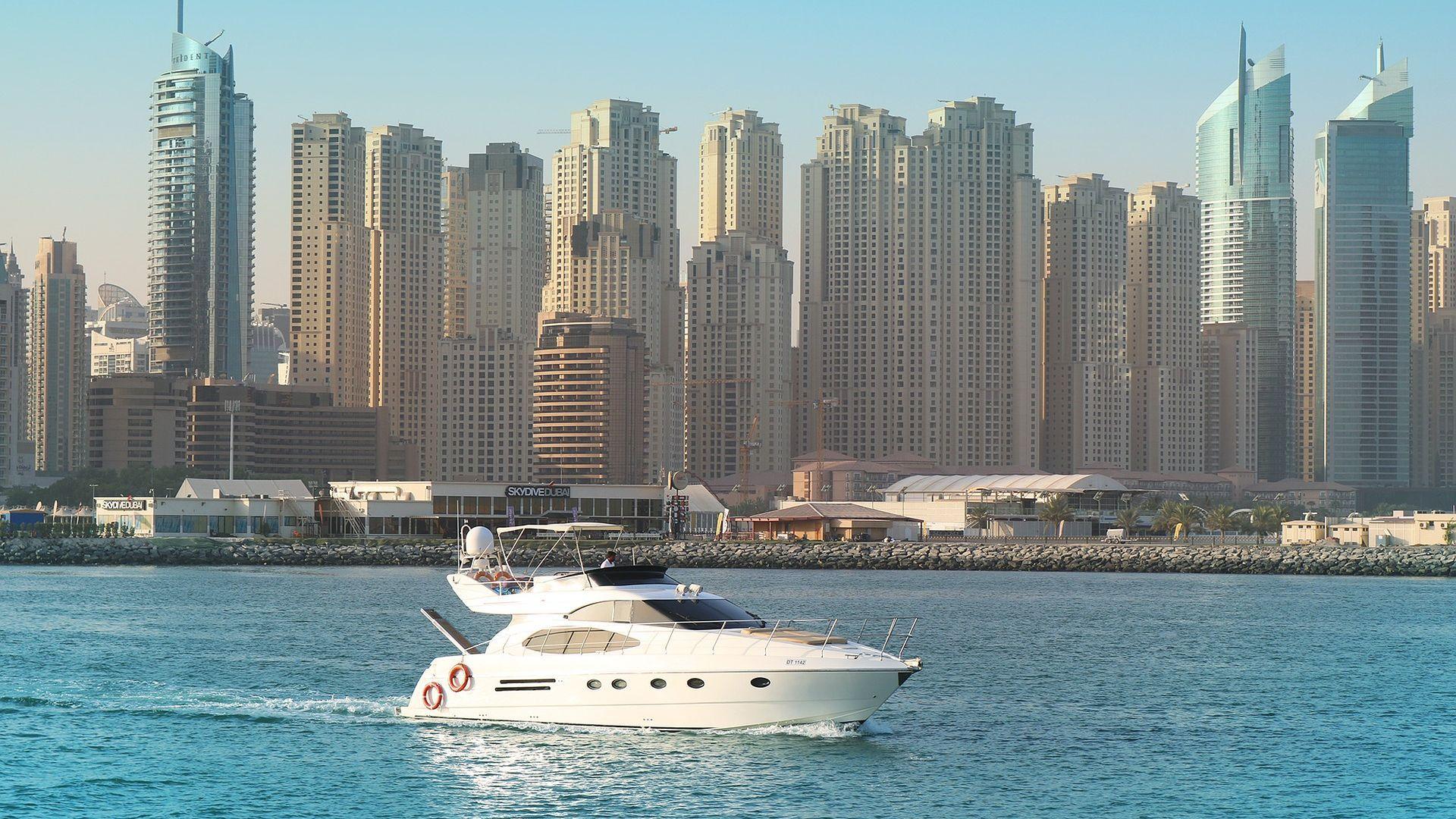 1920x1080 Marina Dubai Yacht and Skyscrapers HD Wallpaper