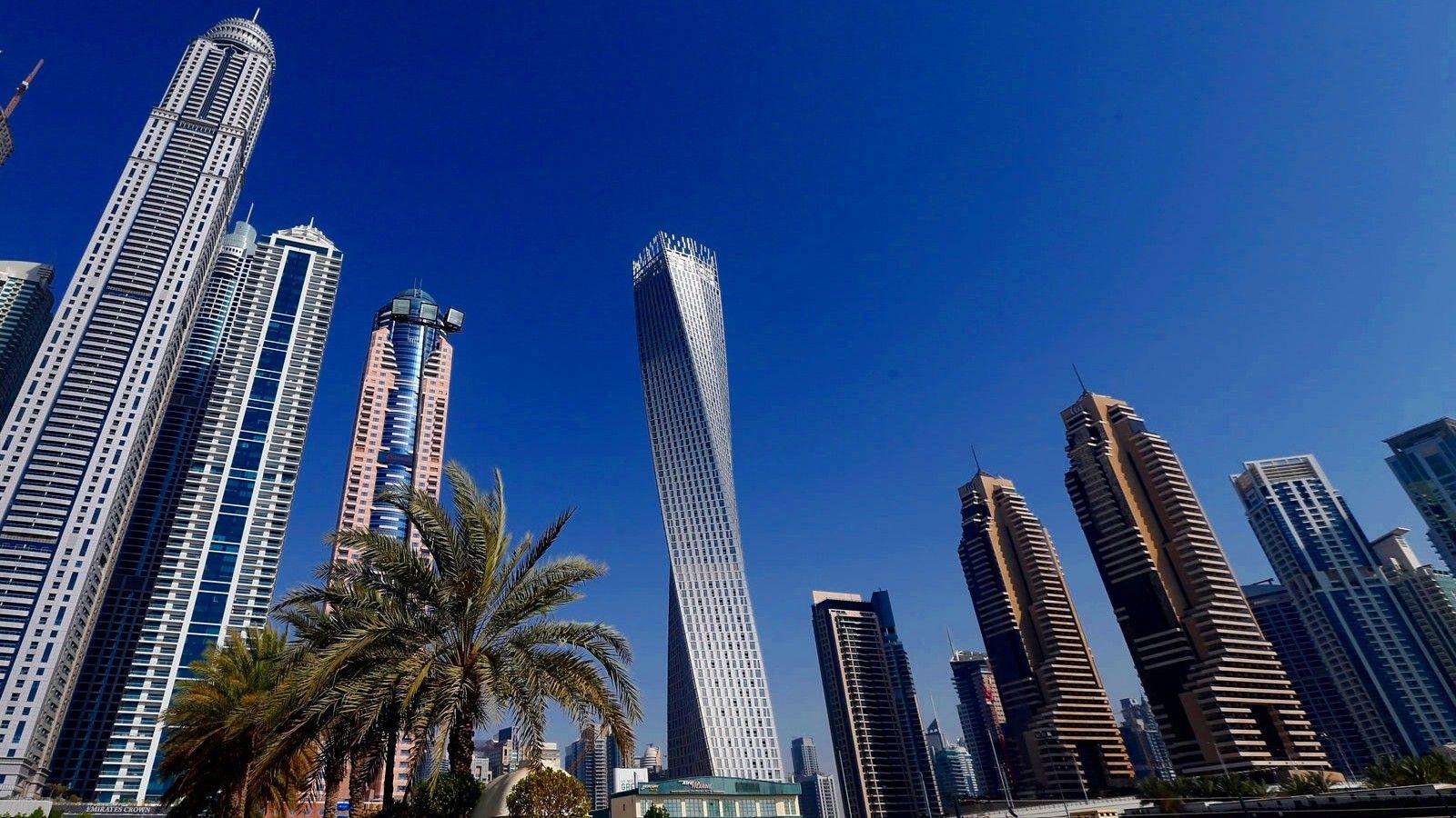 1600x900 landscapes, tower, architecture, urban, buildings, Dubai, skyscrapers, United Arab Emirates, cities, palms, Cayan Tower wallpaper