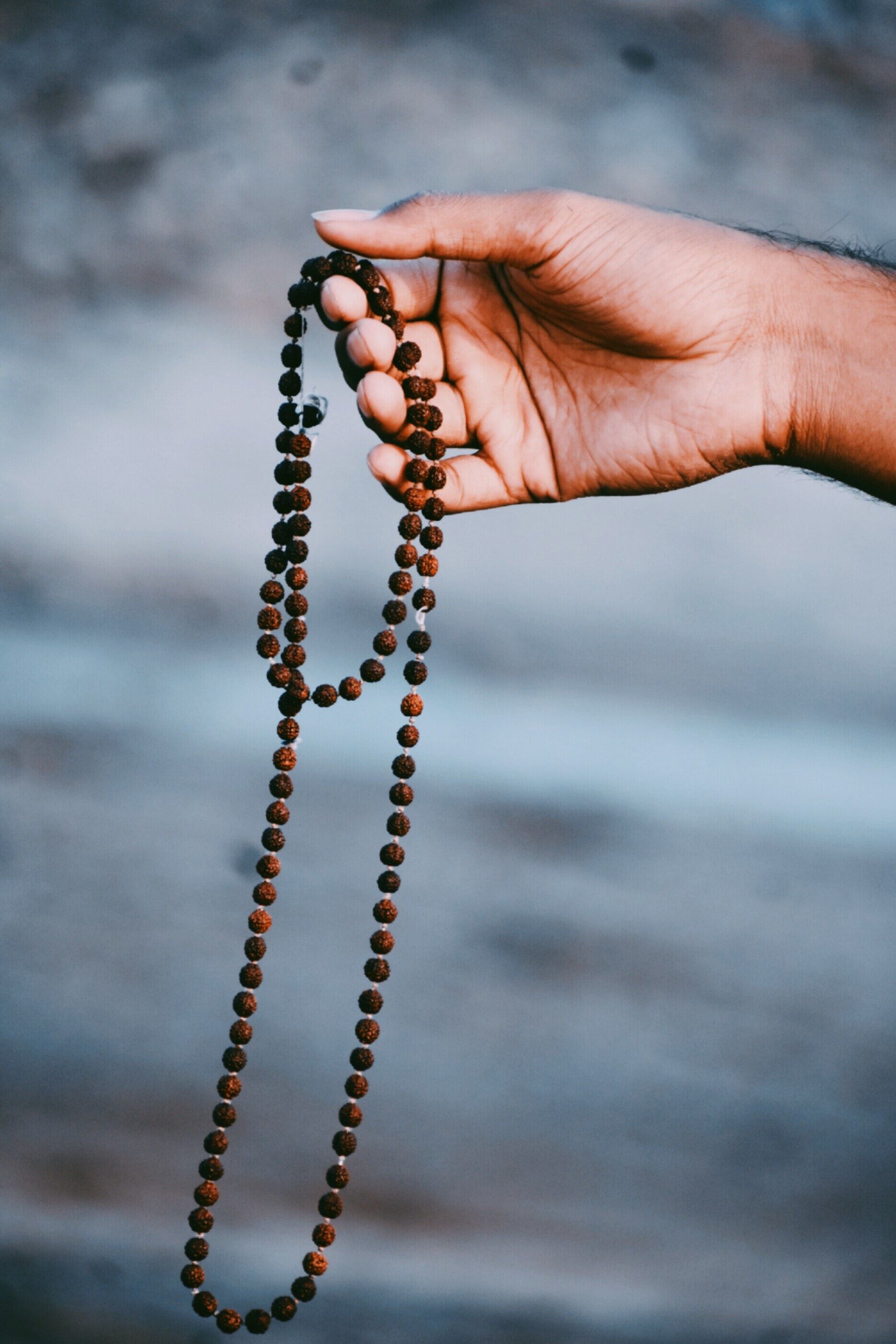 1869x2803 Bead Necklace Being Held · Free
