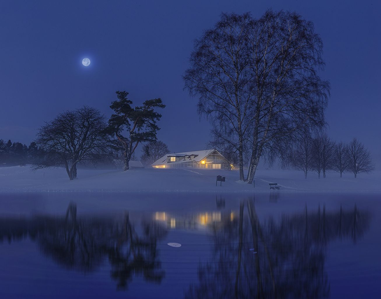 1307x1024 Wallpaper Sweden Winter Nature Snow Moon river Night Trees Building
