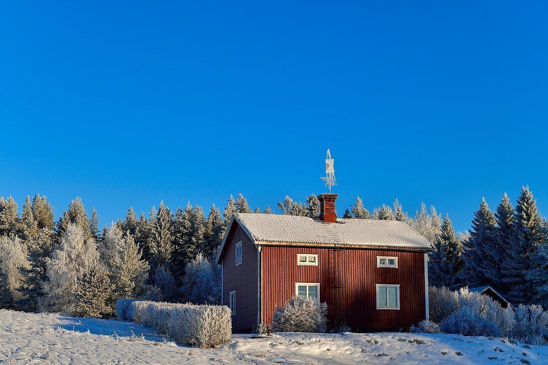 1100x733 Typical Swedish house in deep winter